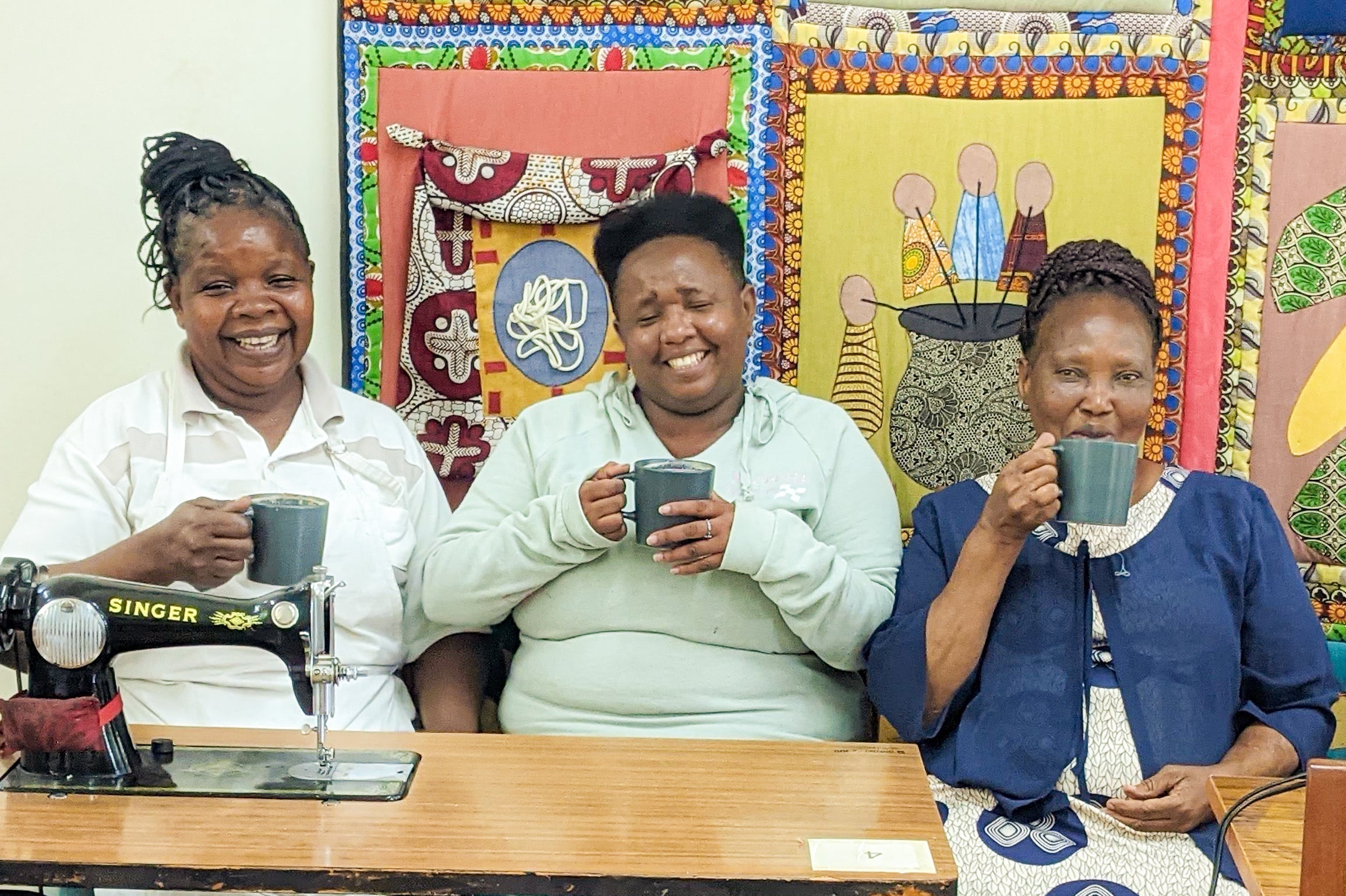 Anna, Vestina, and Alice drinking tea