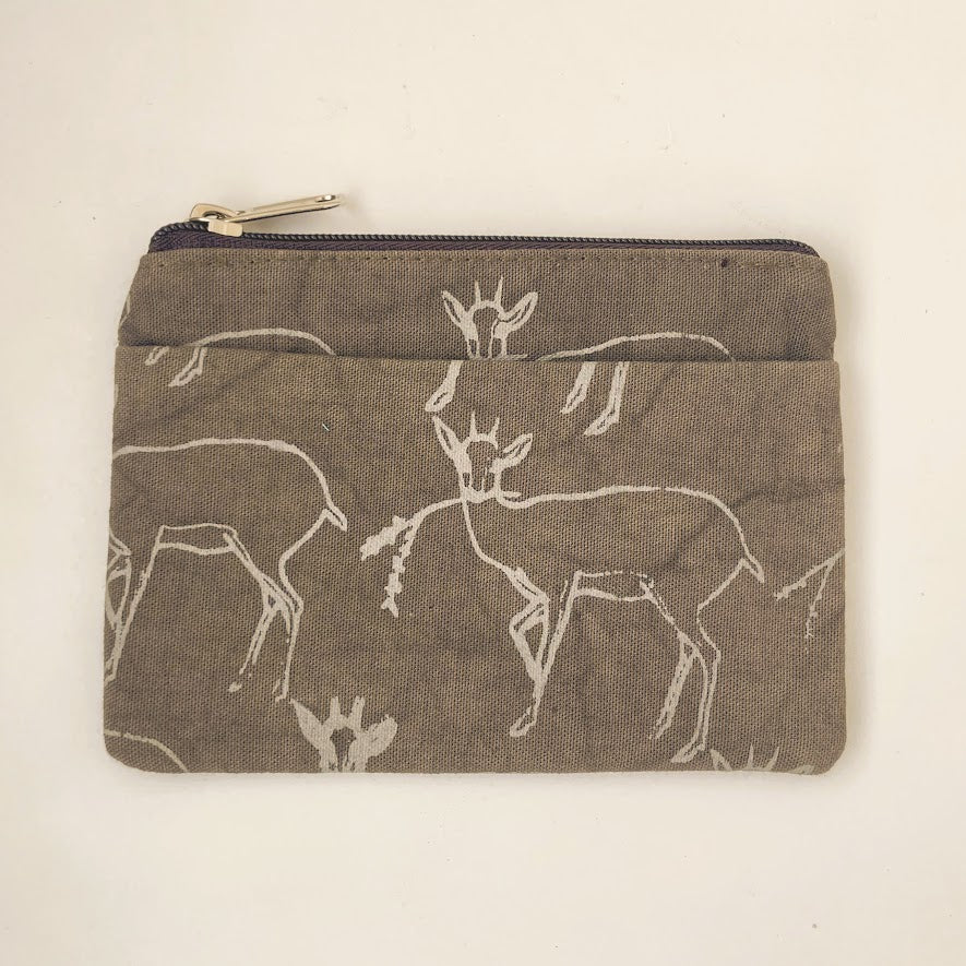 Fabric pouch with deer pattern on a beige background