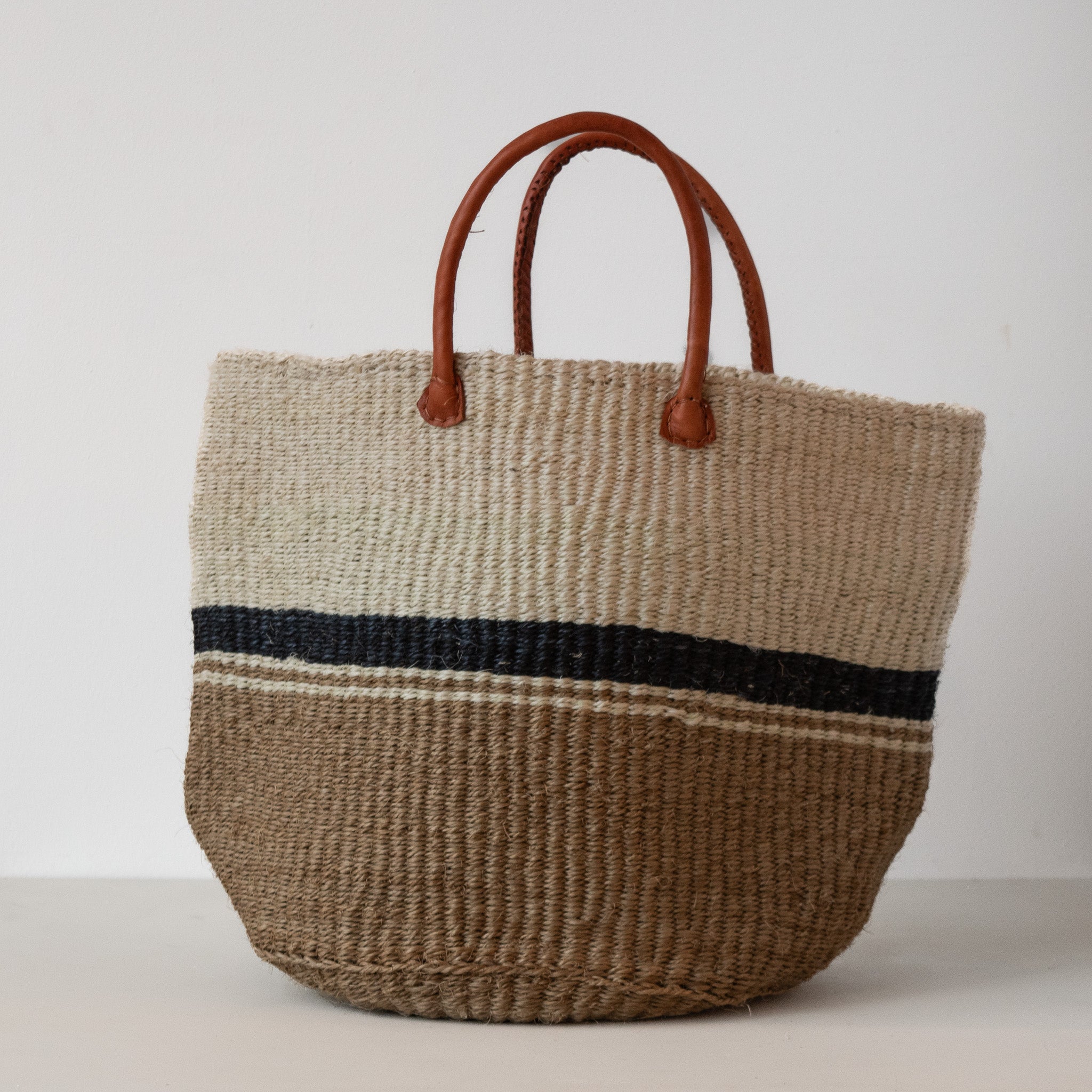 A Fair Trade handwoven sisal basket made by Kenyan artisans for a social enterprise