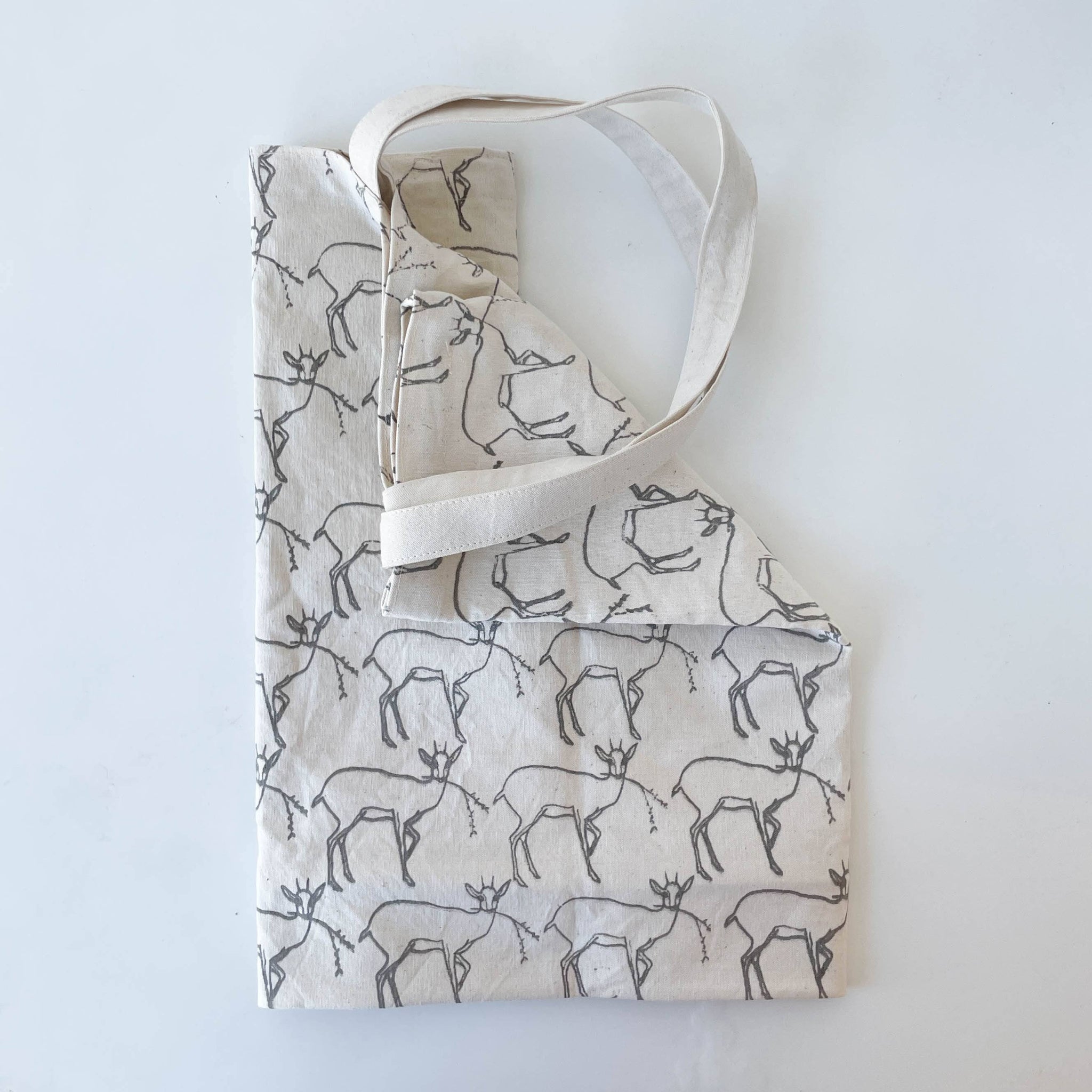 Tote bag with deer pattern on a white background