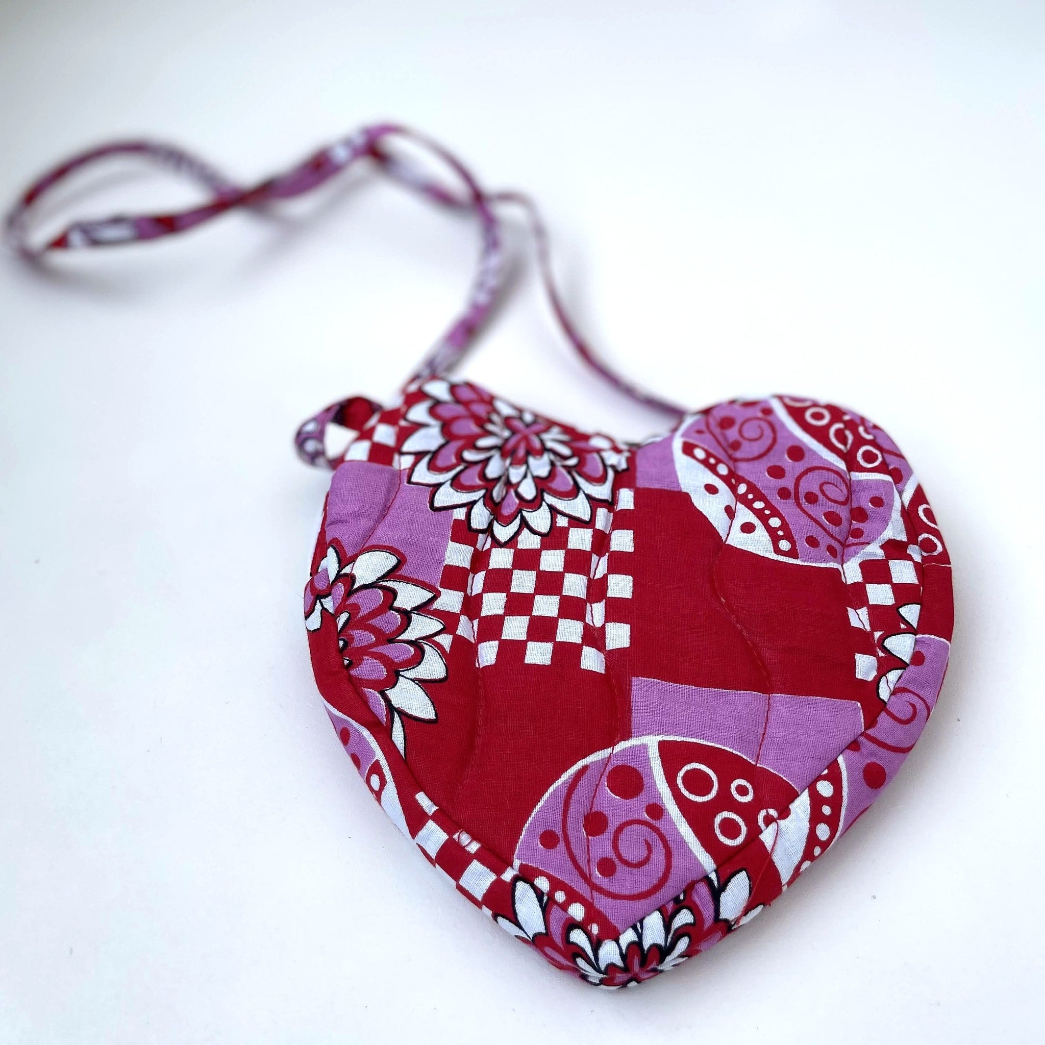 Loving Heart little girls purse handcrafted from kitenge fabric by African refugee women in Nairobi Kenya for a social enterprise