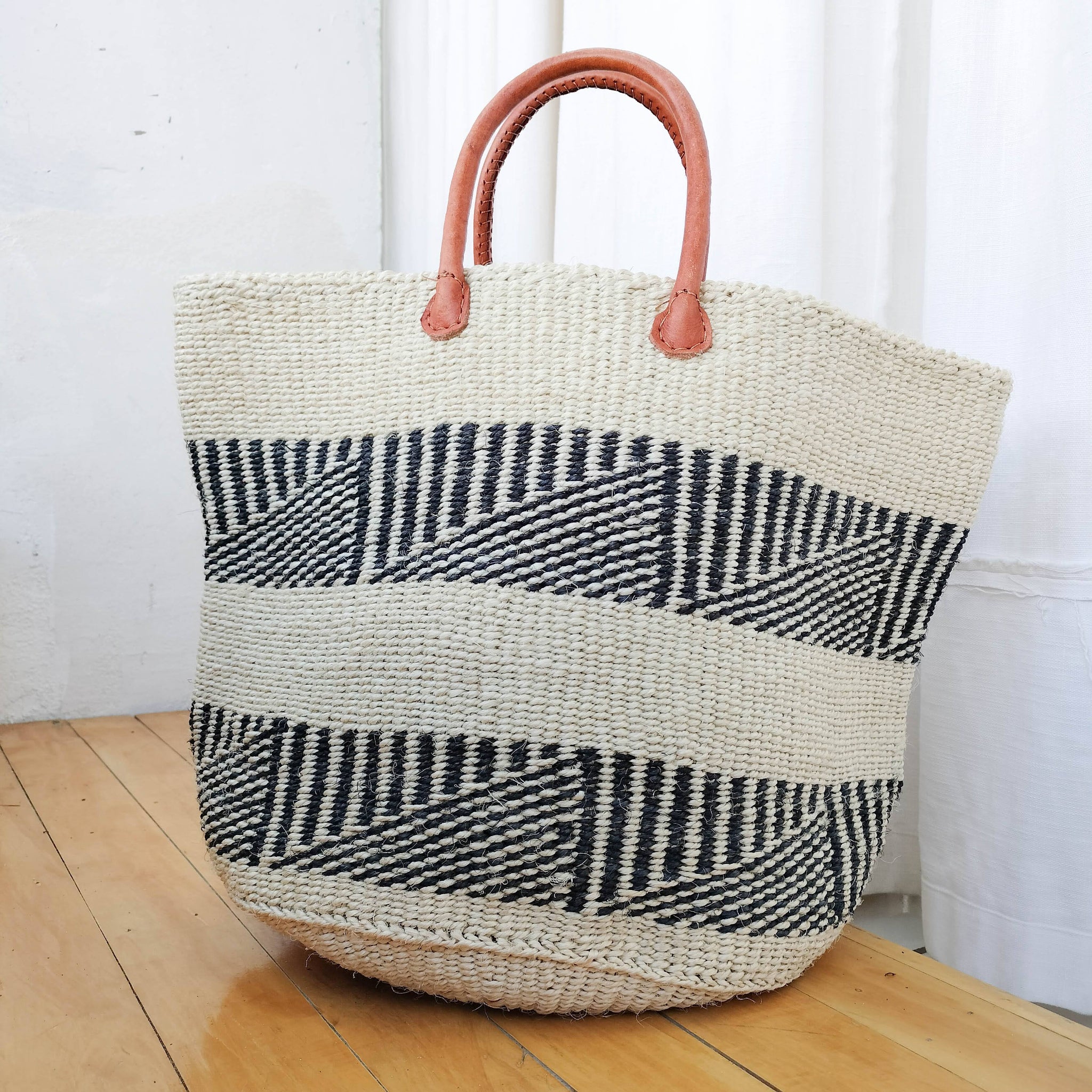 A Fair Trade handwoven sisal basket made by Kenyan artisans