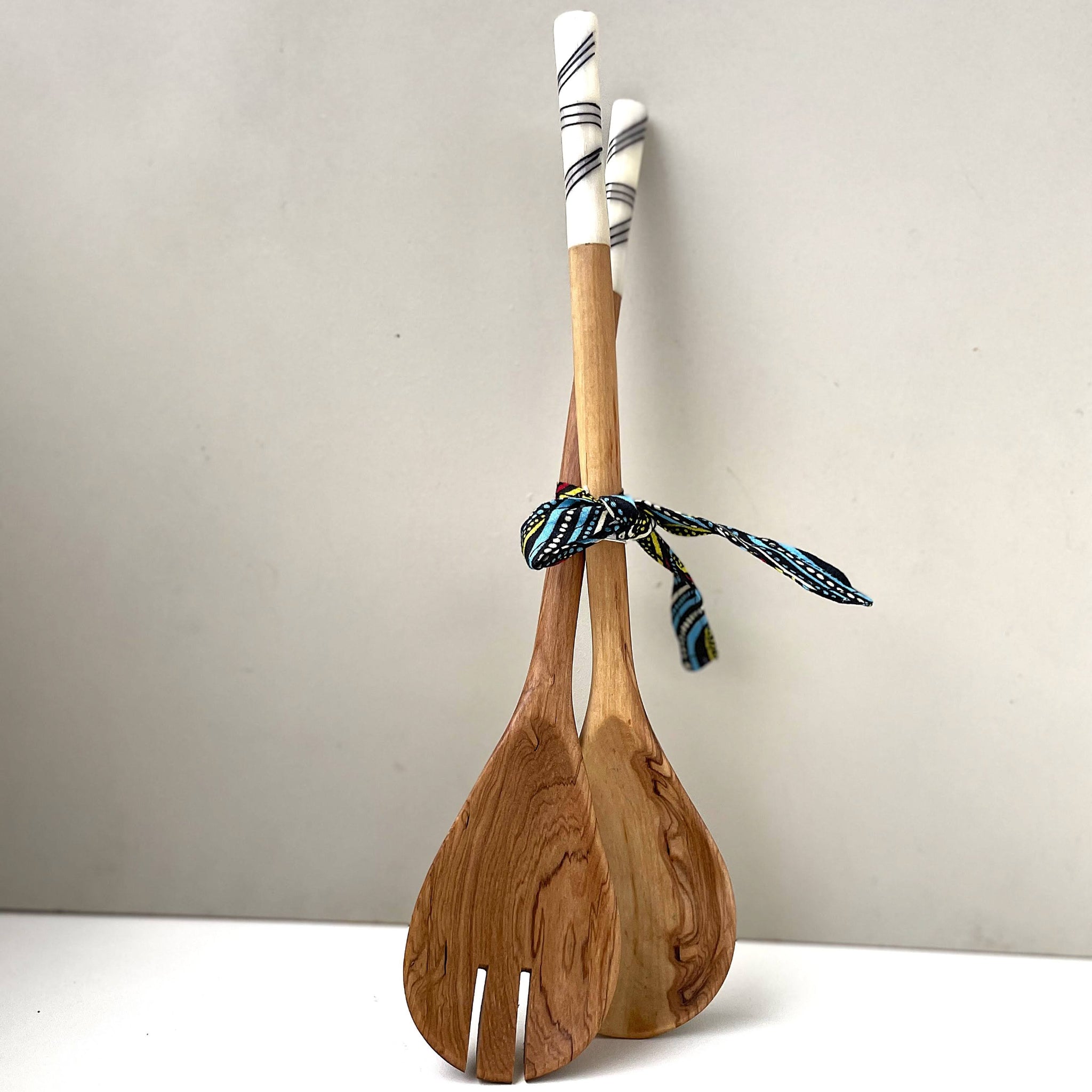 Olivewood salad serving spoon set with bone handles handmade by African artisans in Kenya for a fair trade social enterprise