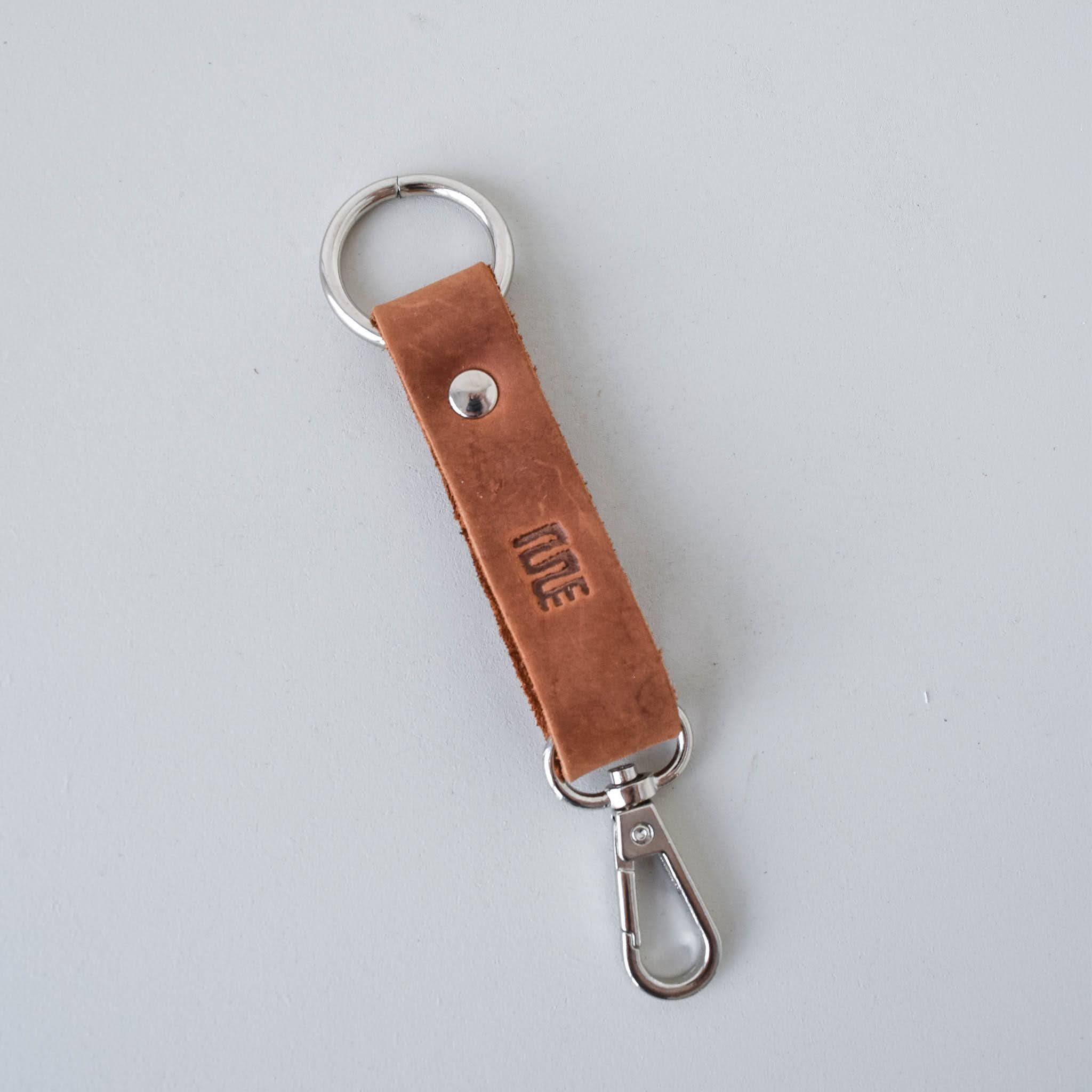 Leather key clip - handmade by the Amani women using Kenyan leather for a Fair Trade boutique