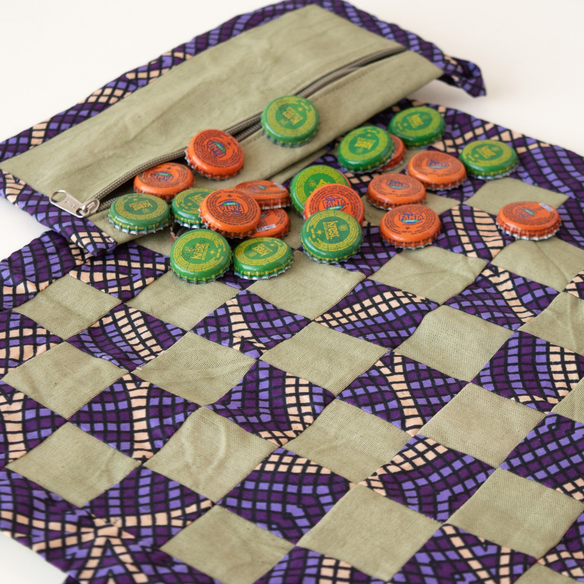 Bottle Cap Games - Kenyan materials and design for a fair trade boutique