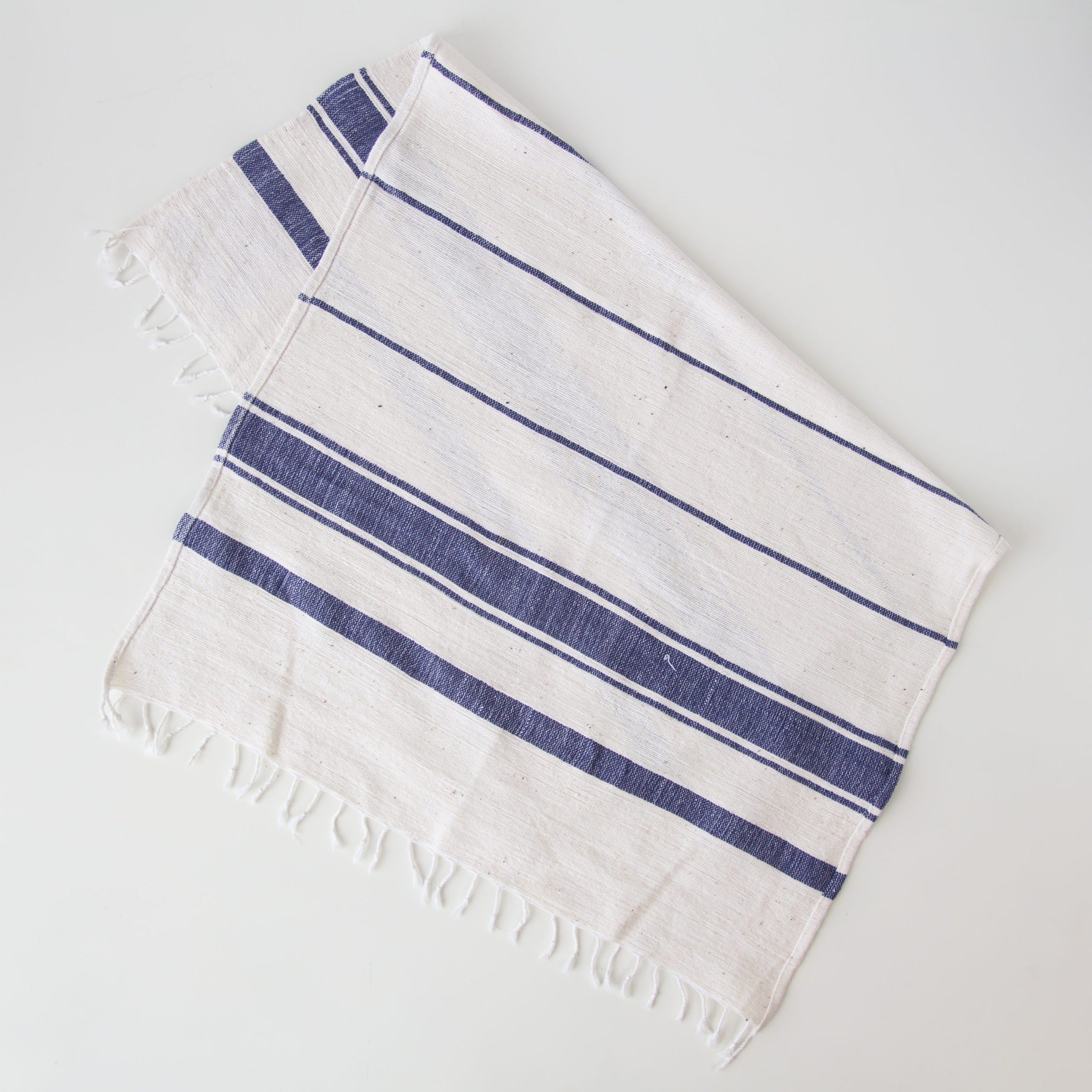 Ethiopian Woven Dish Towel - hand-crafted in Ethiopia using African fabrics and materials for a fair trade Etched Leaf Earrings- made for a fair trade social enterprise