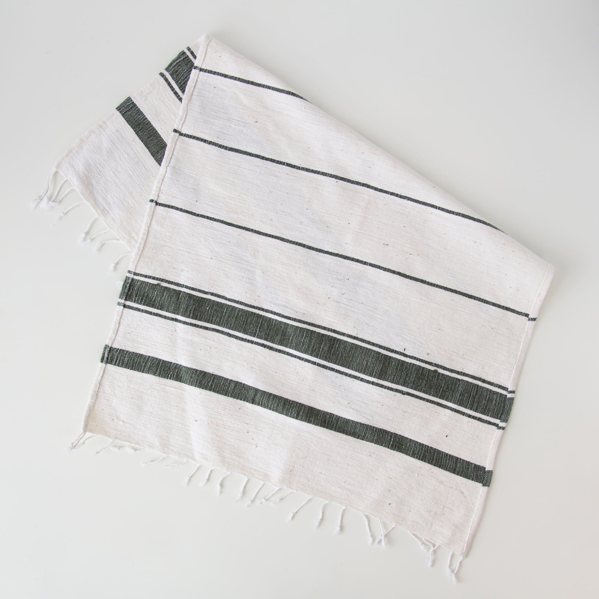 Ethiopian Woven Dish Towel - hand-crafted in Ethiopia using African fabrics and materials for a fair trade Etched Leaf Earrings- made for a fair trade social enterprise