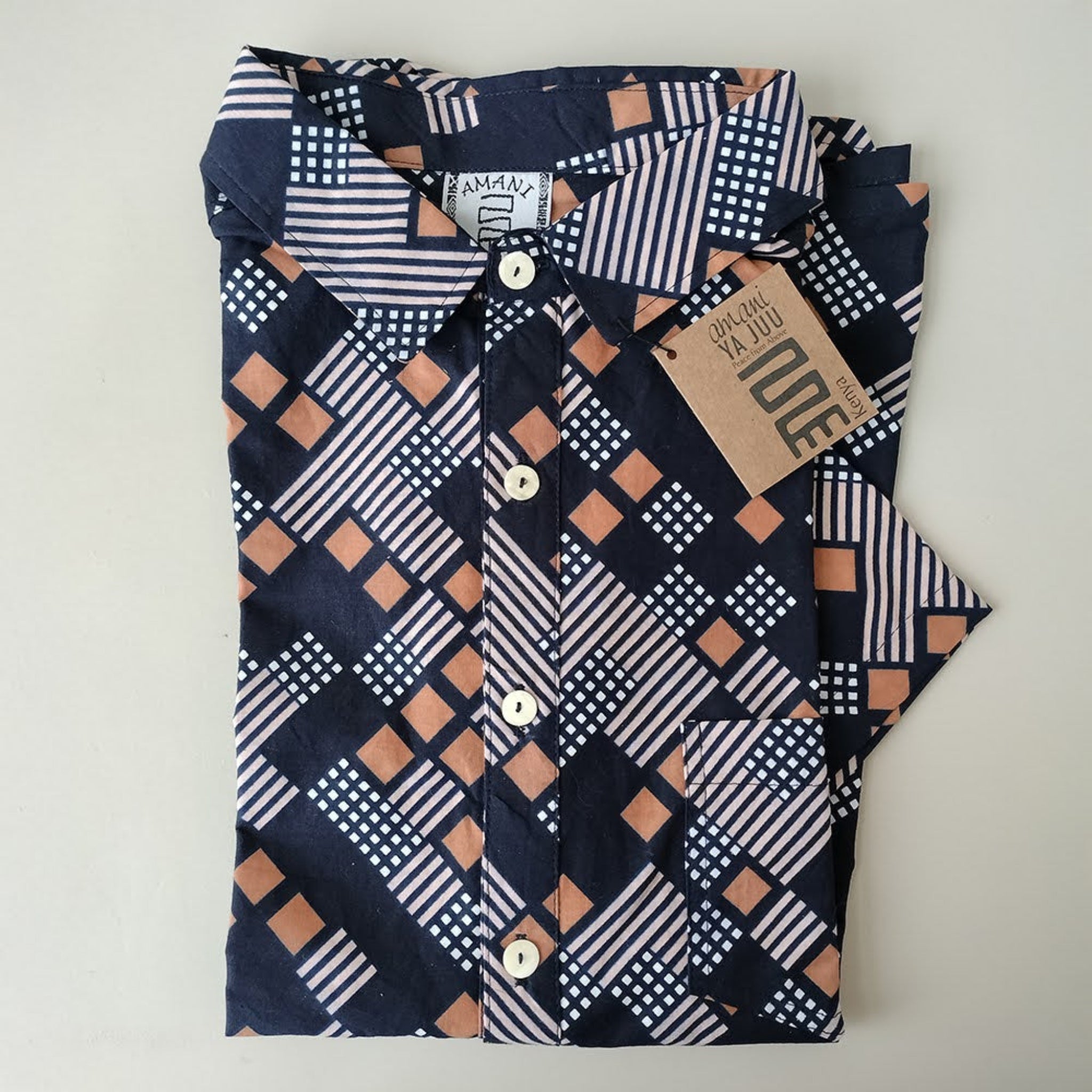 Men's kitenge shirt handmade by the women of Amani ya Juu in Kenya for a fair trade social enterprise