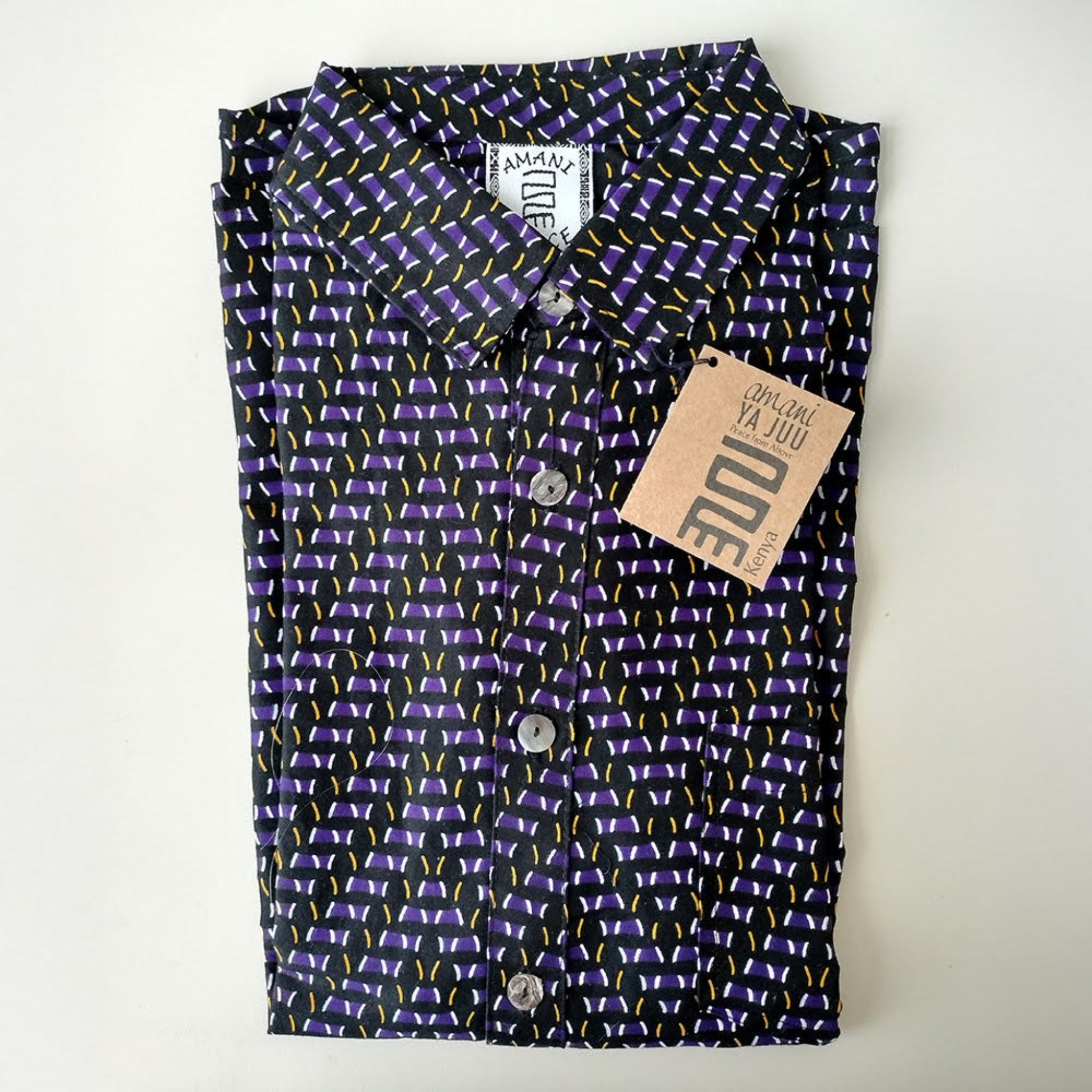 Men's kitenge shirt handmade by the women of Amani ya Juu in Kenya for a fair trade social enterprise
