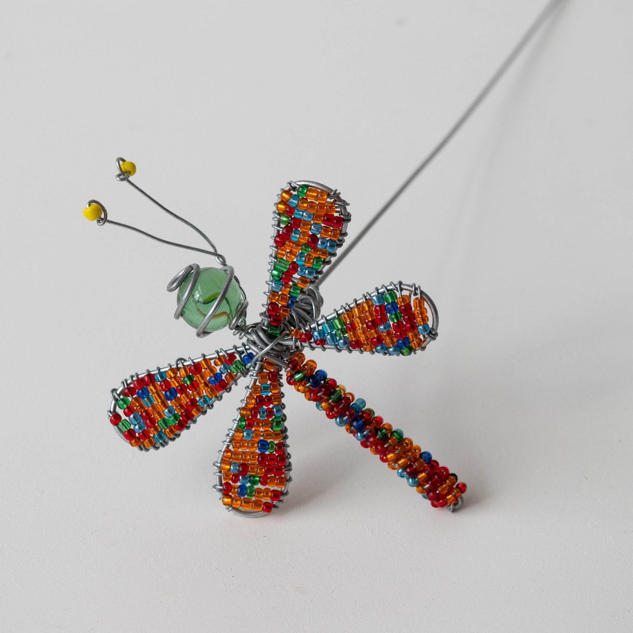 Beaded dragonfly hand crafted by Kenyan artisans for a fair trade social enterprise