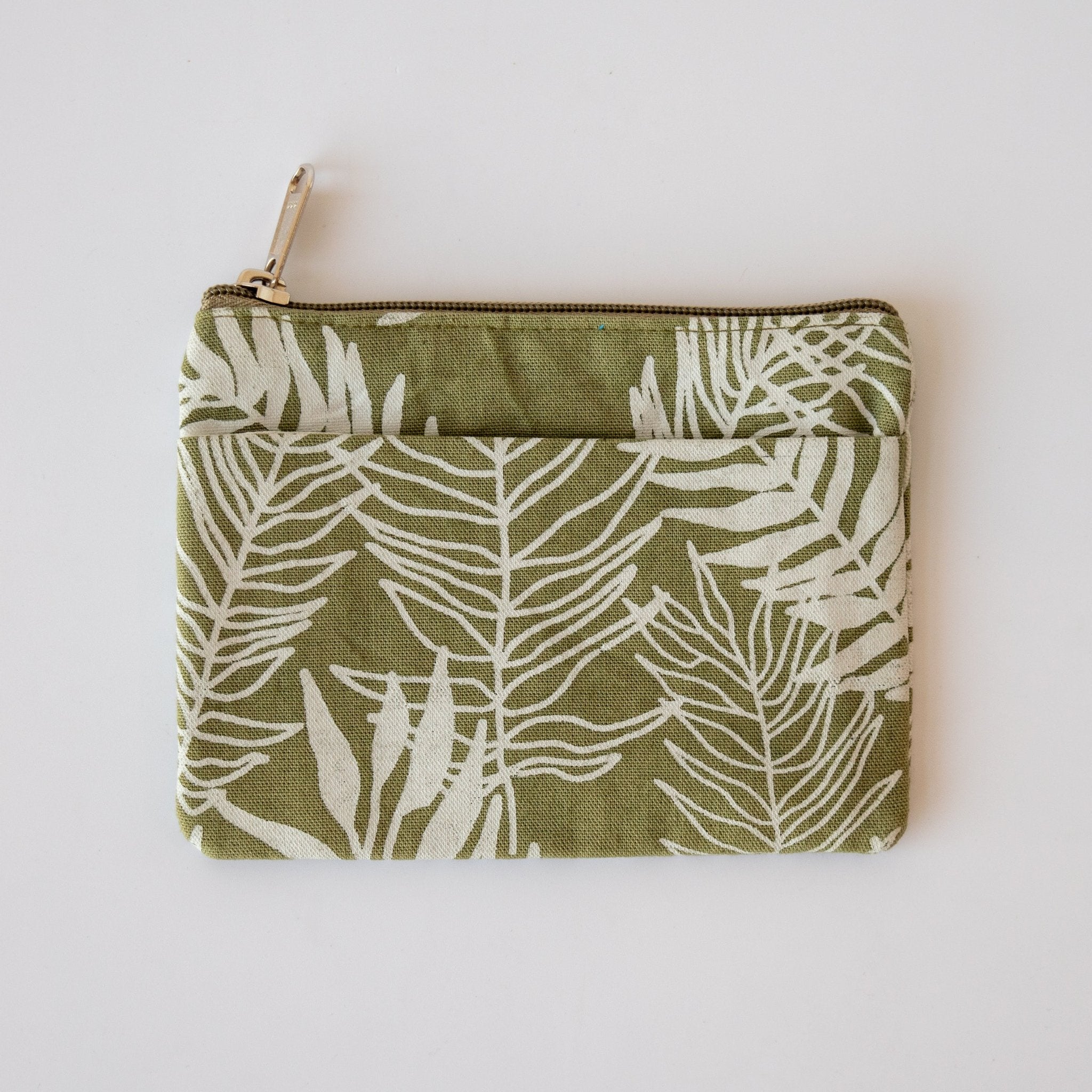 Moss colored coin purse with a fern pattern on a white background.