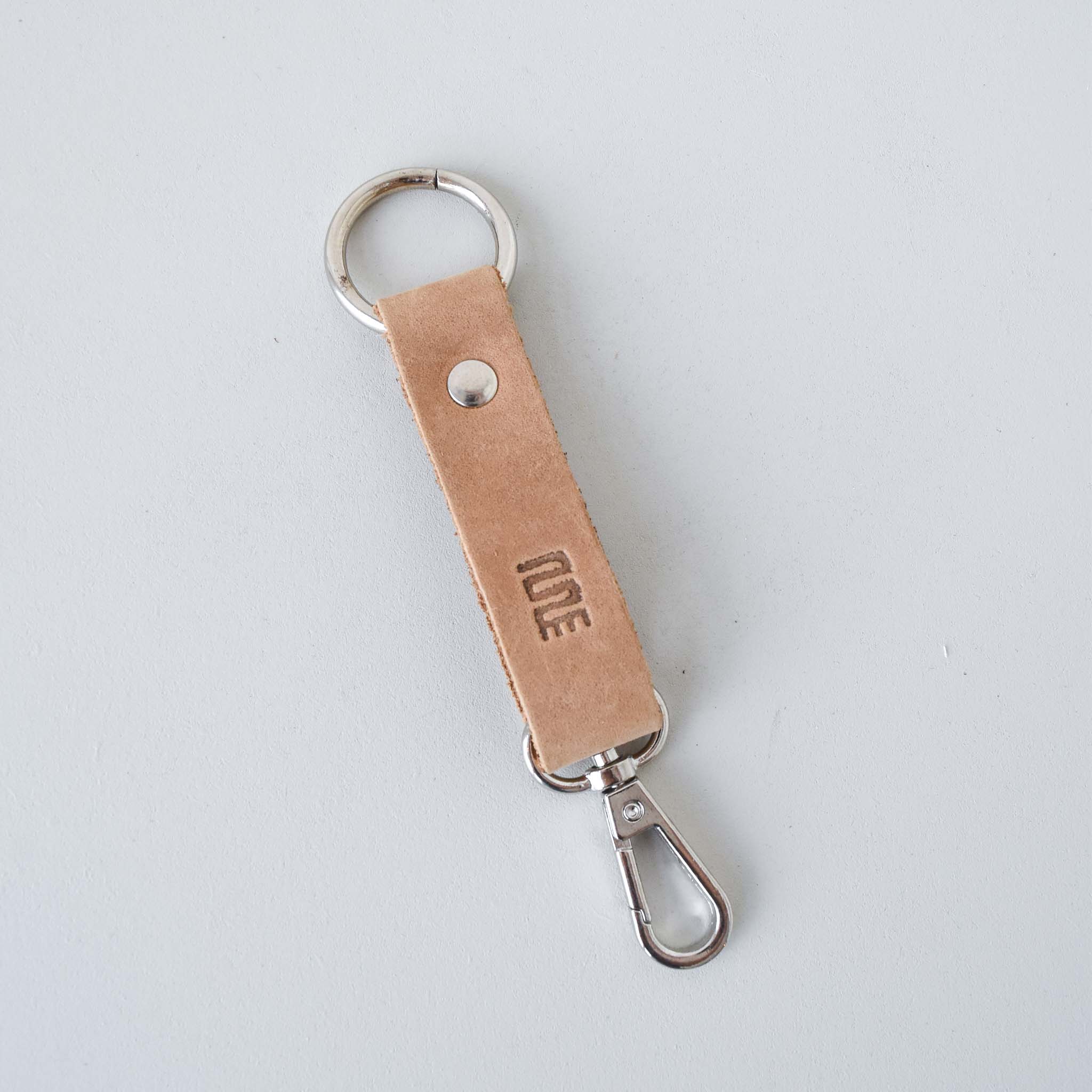 Leather key clip - handmade by the Amani women using Kenyan leather for a Fair Trade boutique