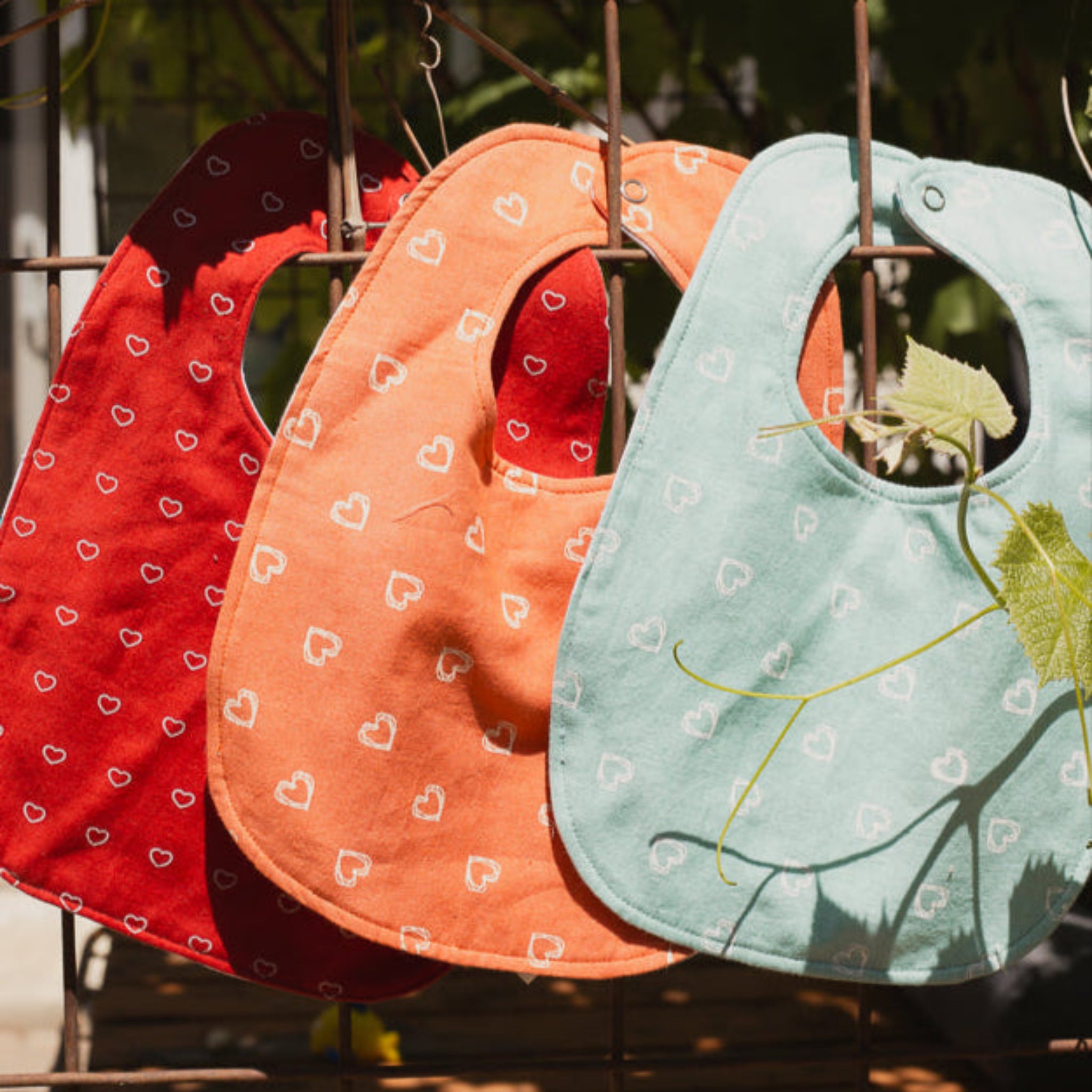 Watoto Baby Bib - Kenyan materials and design for a fair trade social enterprise