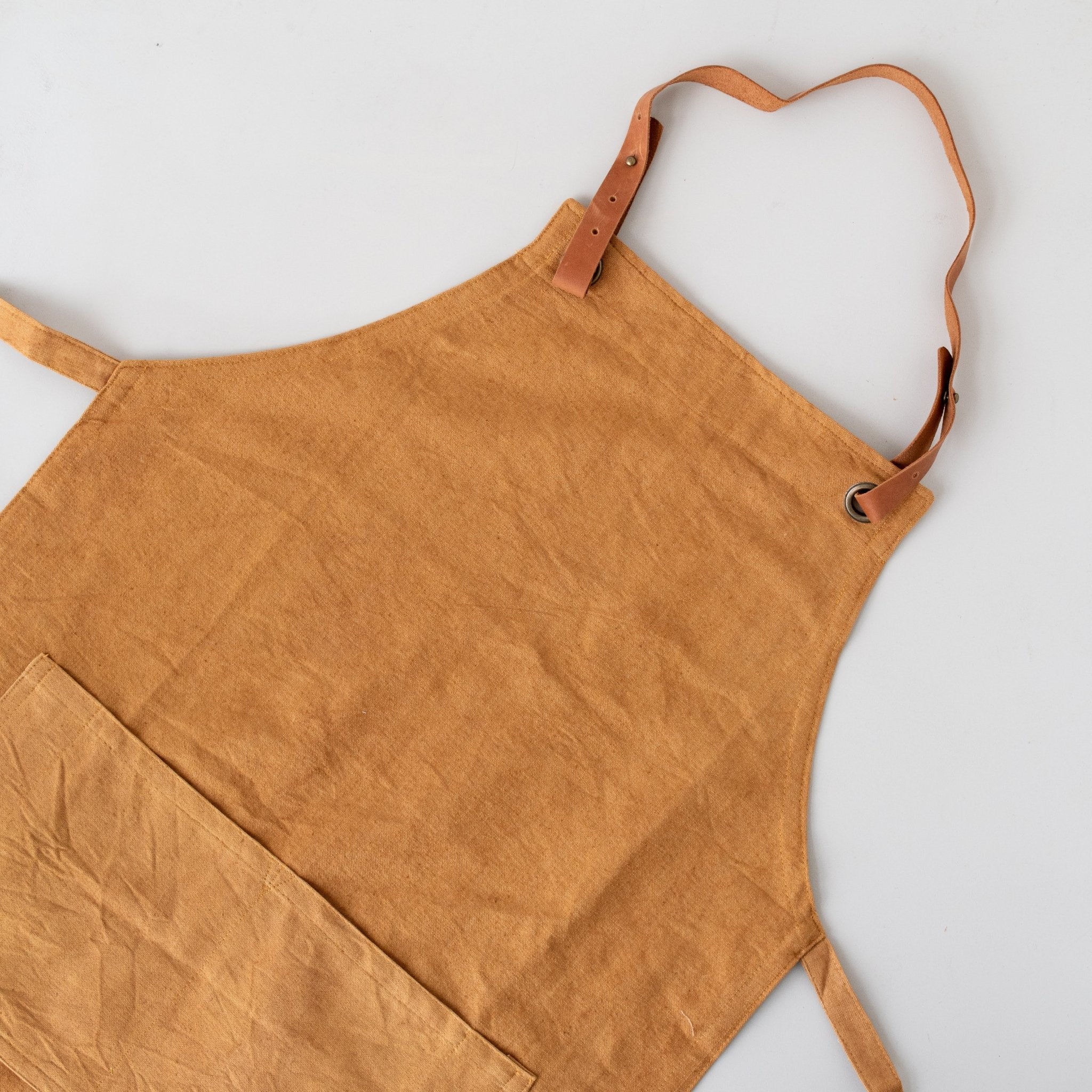Women's Canvas & Leather Apron - handmade by the women of Amani using Kenyan materials for a Fair Trade boutique