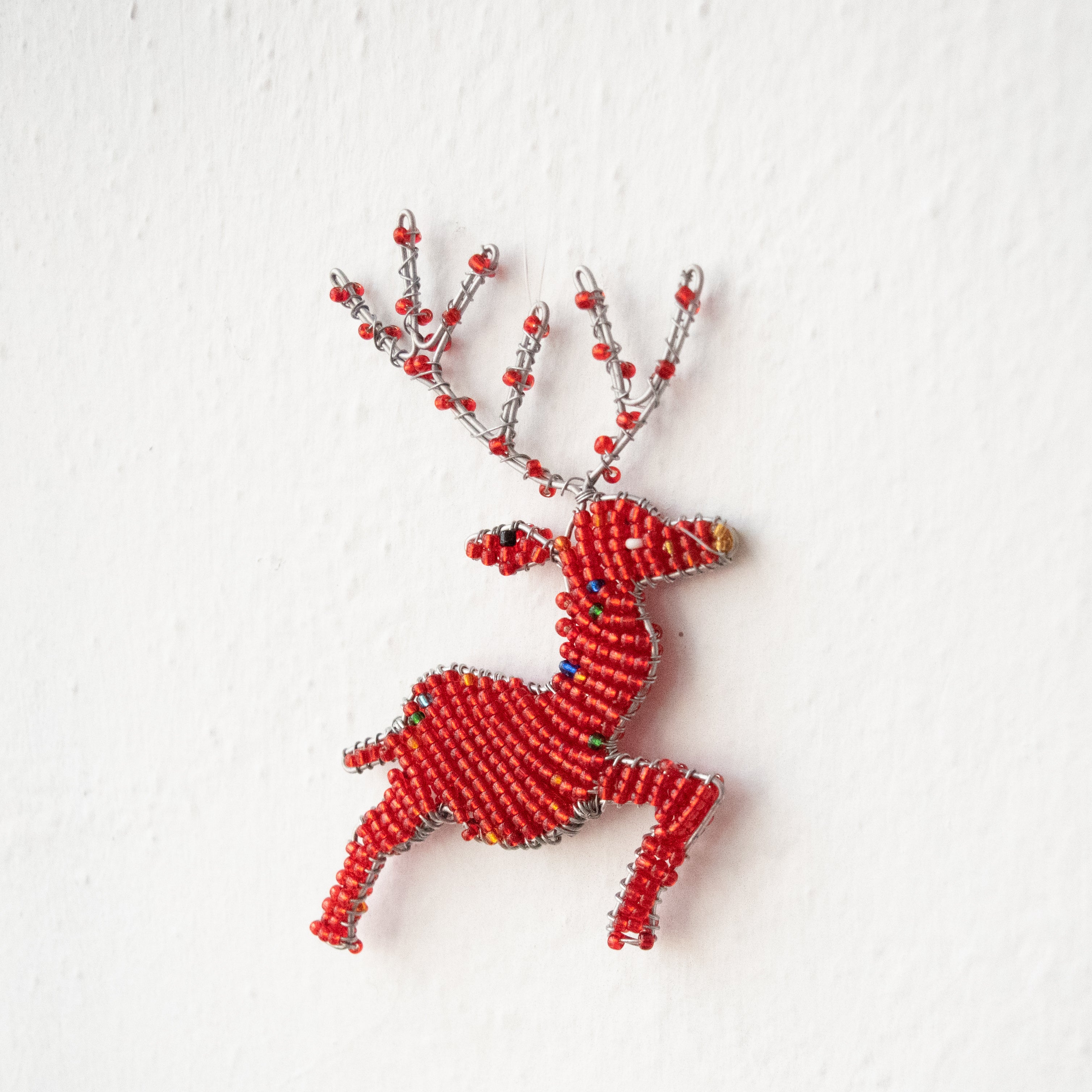 Beaded Reindeer Ornament - handmade by Kenyan market artisans for a Fair Trade social enterprise