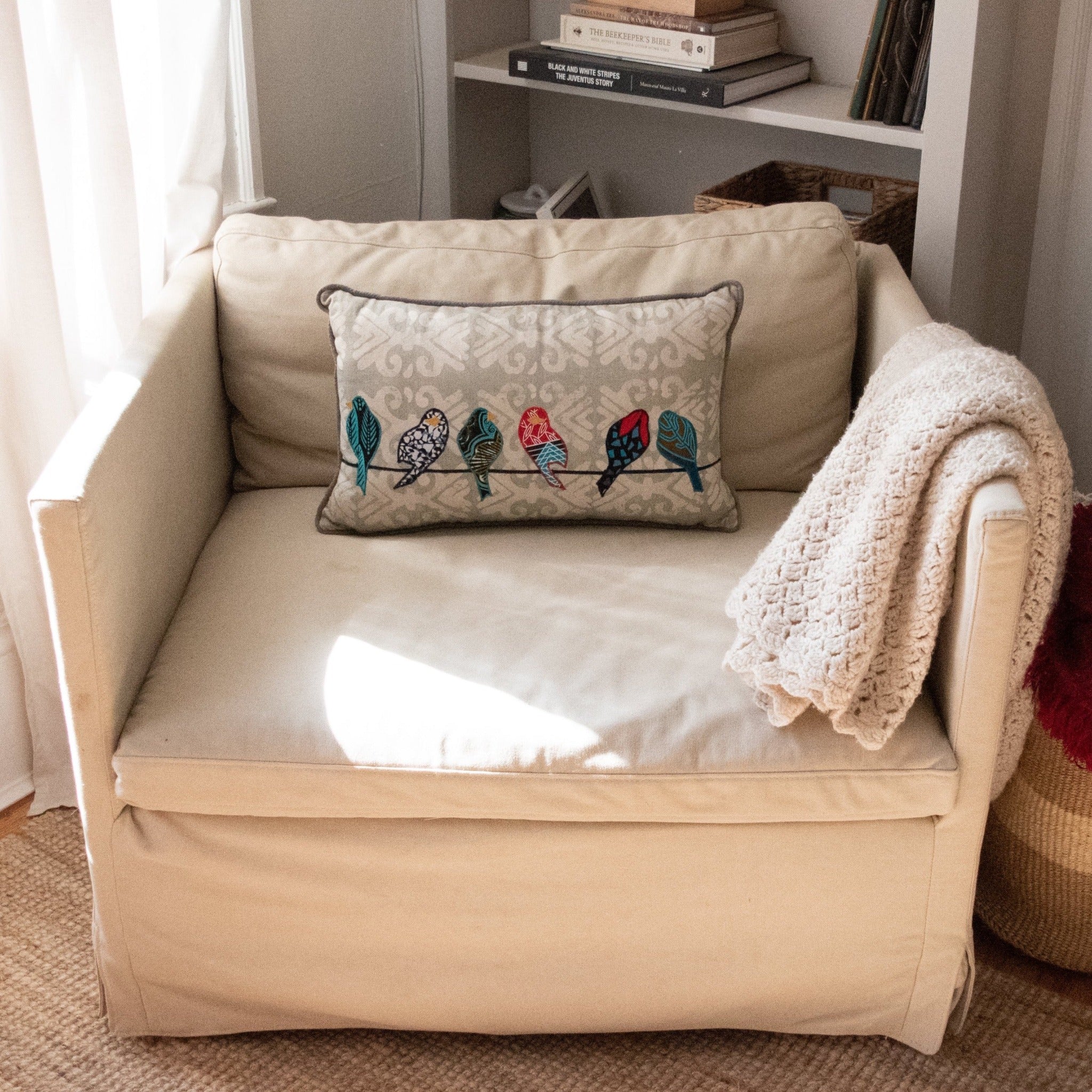 Birds on a Wire Pillow - handmade by the women of Amani using Kenyan materials for a Fair Trade boutique