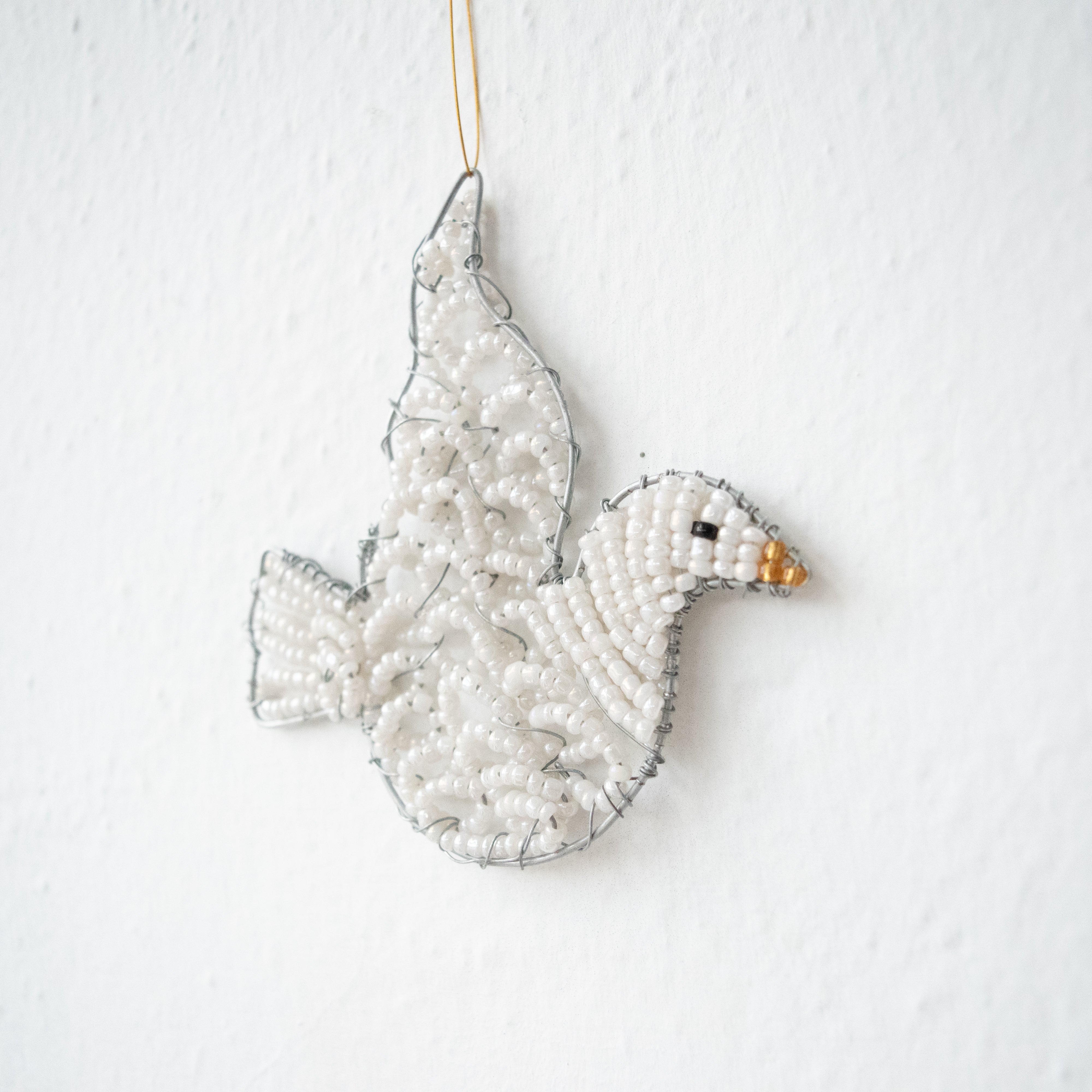 Shanga white dove Christmas ornament - handmade by Kenyan artisans for a fair trade social enterprise