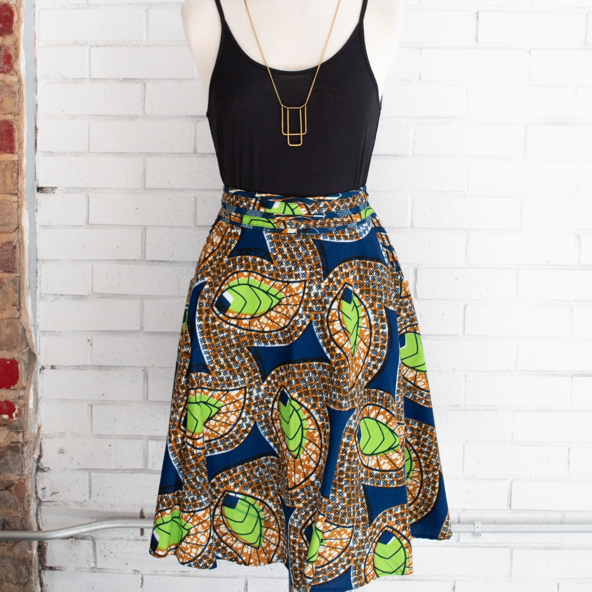 One-of-a-kind handmade kitenge skirt fashioned by refugee women in East Africa for a fair trade social enterprise