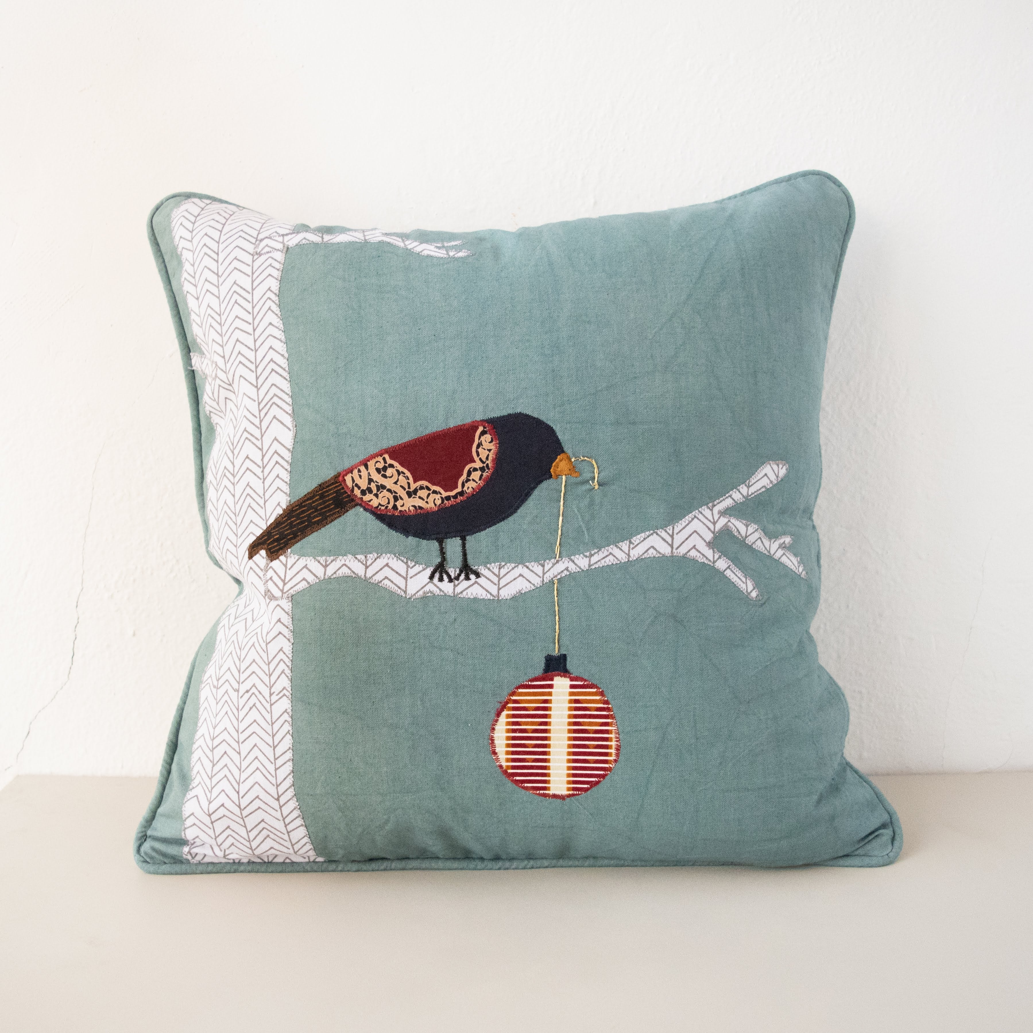 Christmas Bird Pillow - Kenyan materials and design for a fair trade Canvas Travel Case - handmade by the women of Amani using Kenyan materials for a Fair Trade social enterprise