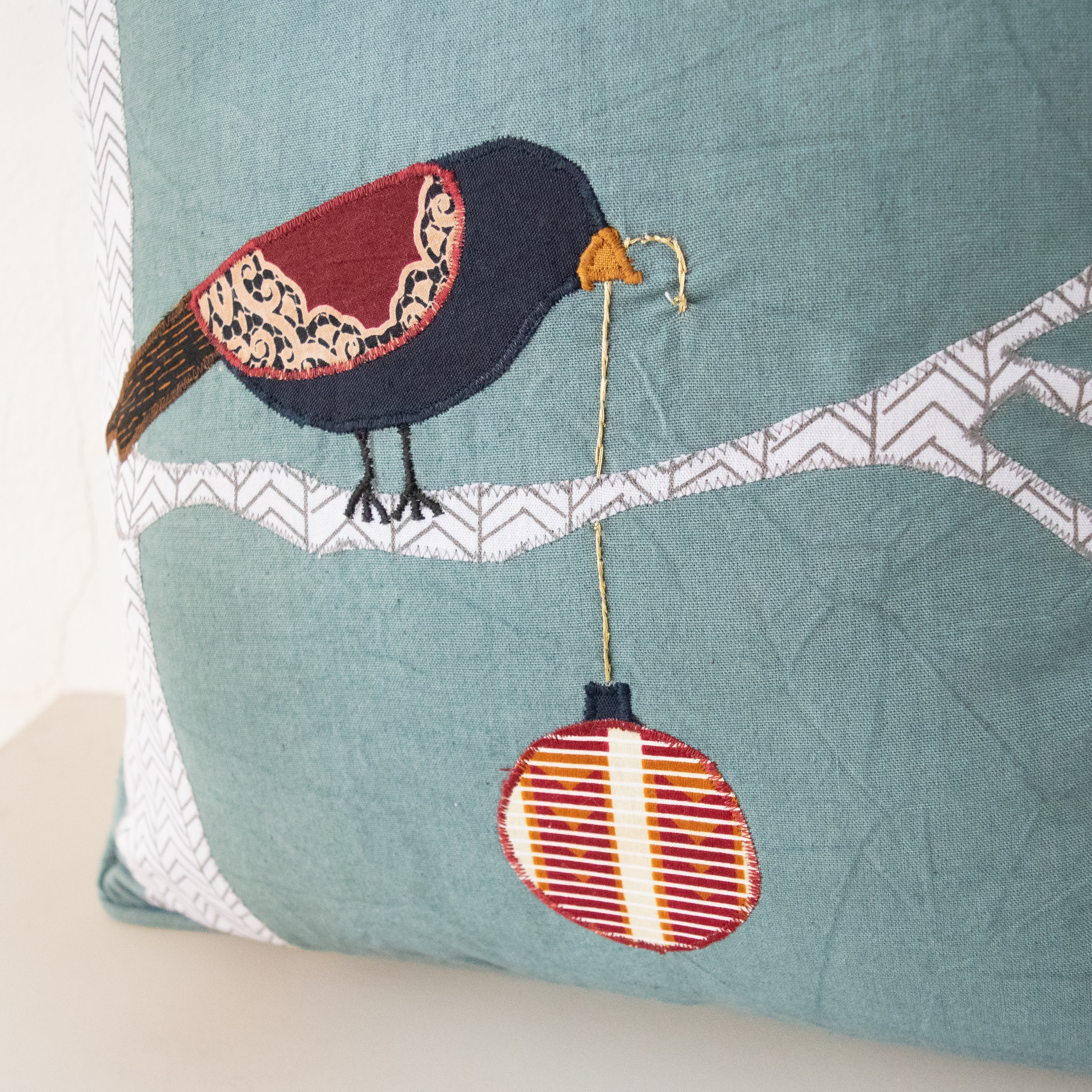 Christmas Bird Pillow - Kenyan materials and design for a fair trade Canvas Travel Case - handmade by the women of Amani using Kenyan materials for a Fair Trade social enterprise