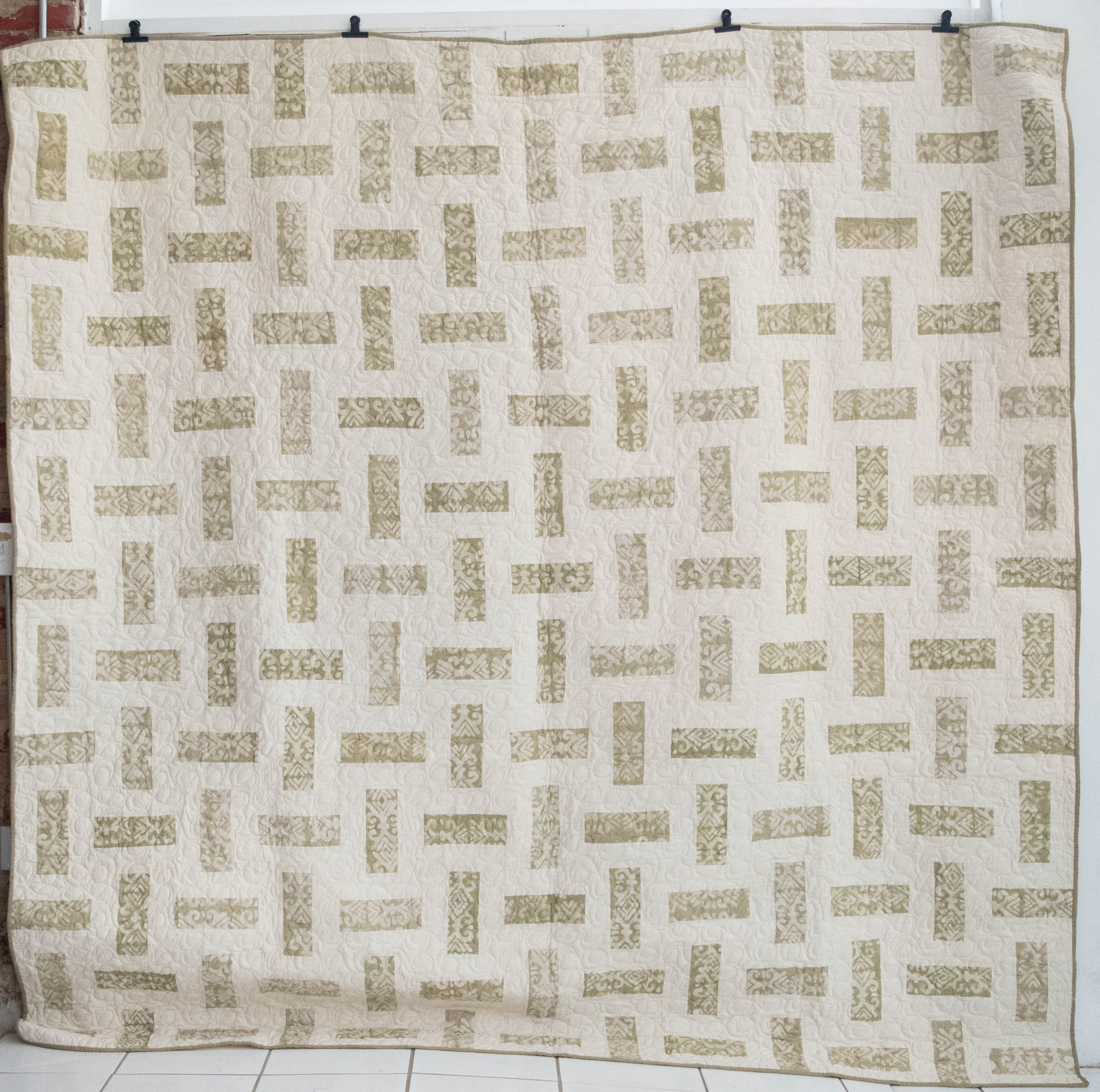 Hand stitched, hand dyed fabrics pieced together for a fair trade social enterprise