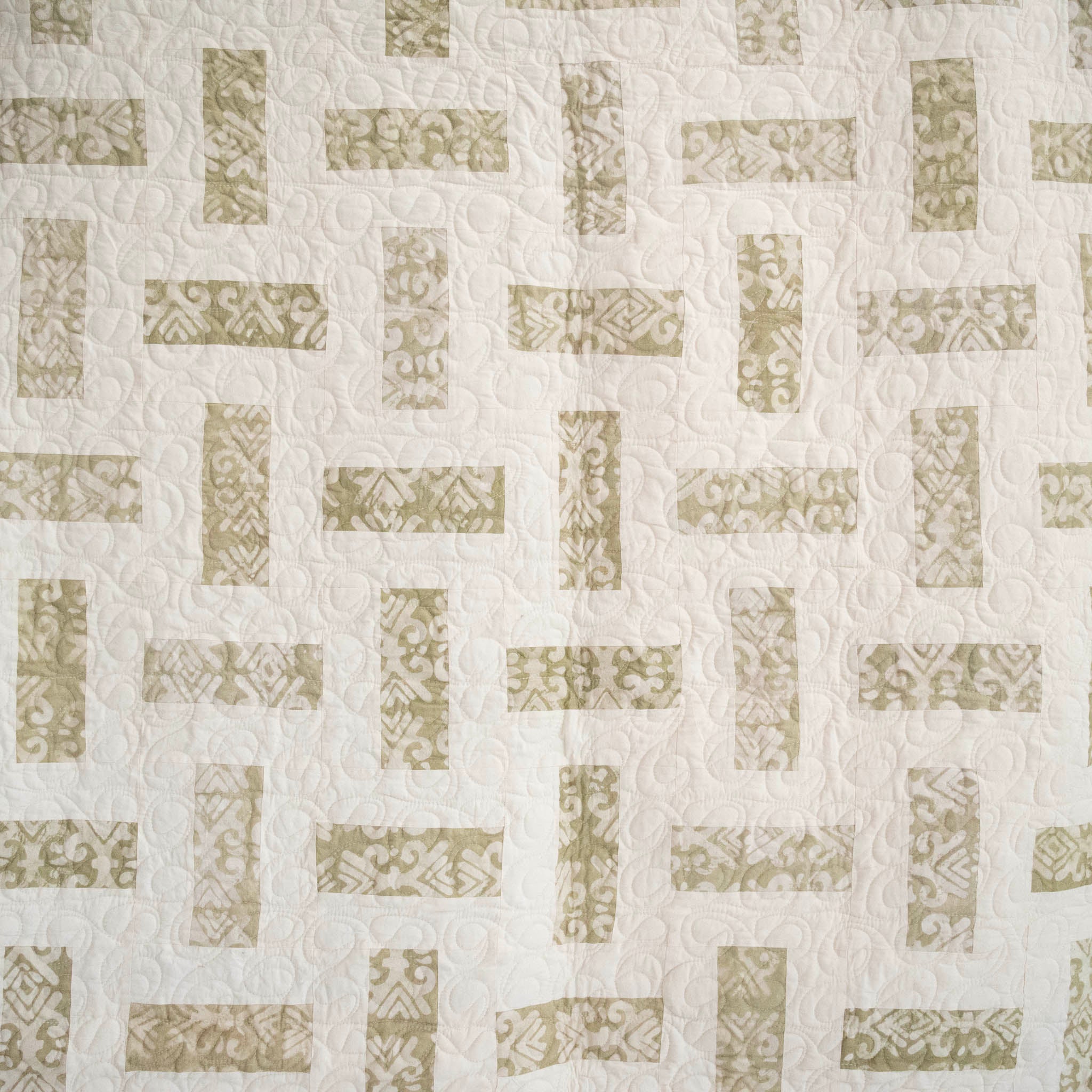 Hand stitched, hand dyed fabrics pieced together for a fair trade social enterprise