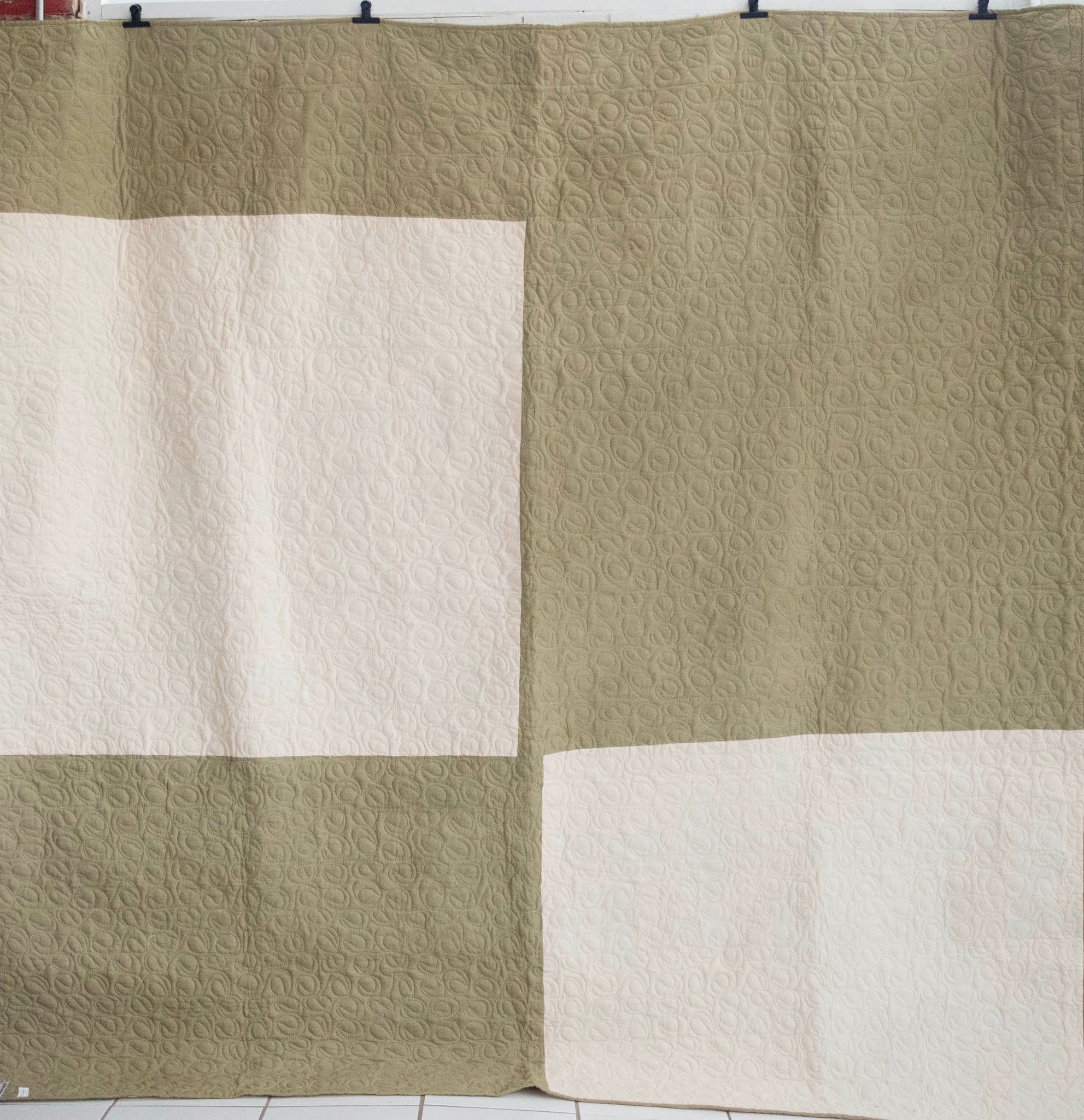 Hand stitched, hand dyed fabrics pieced together for a fair trade social enterprise
