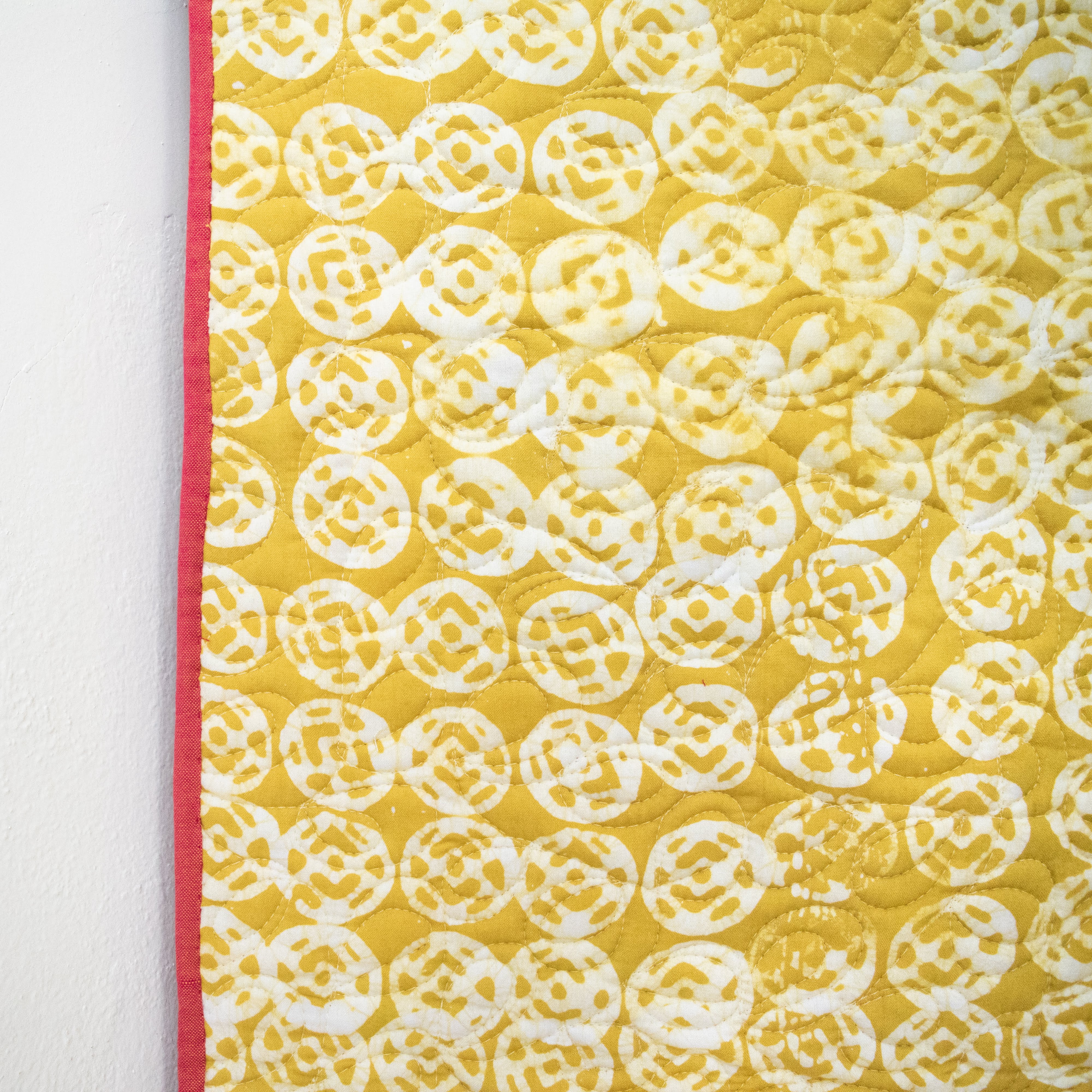 Lil Peanut' Baby Quilt - Kenyan materials and design for a fair trade boutique