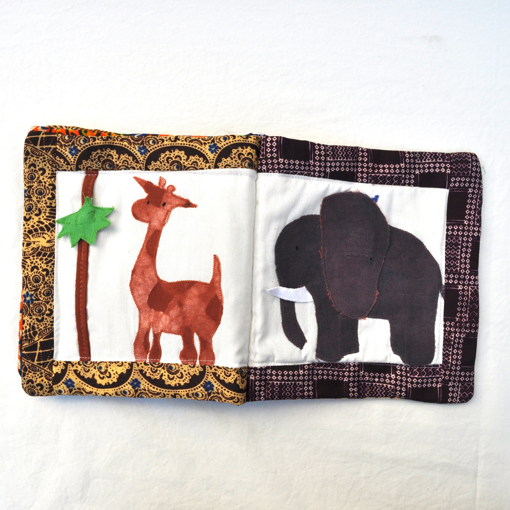 Safari Baby Book - Kenyan materials and design for a fair trade boutique