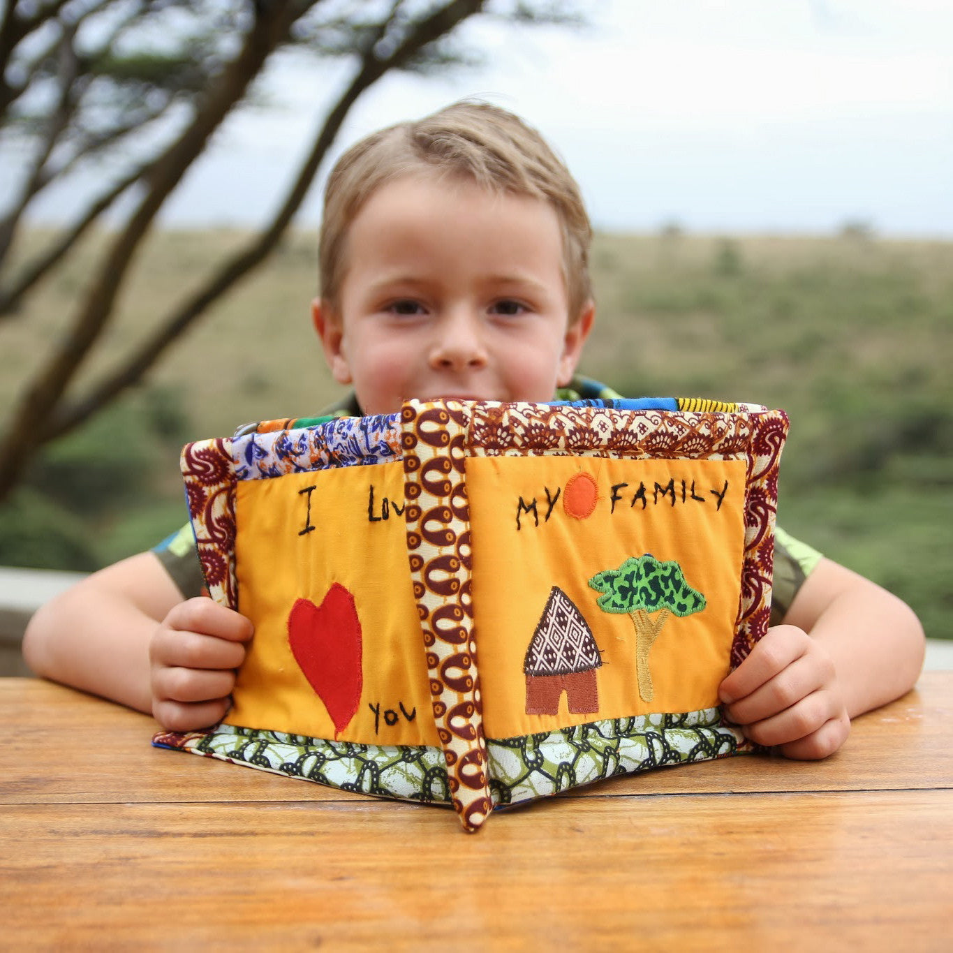 Baby Album - Kenyan materials and design for a fair trade boutique