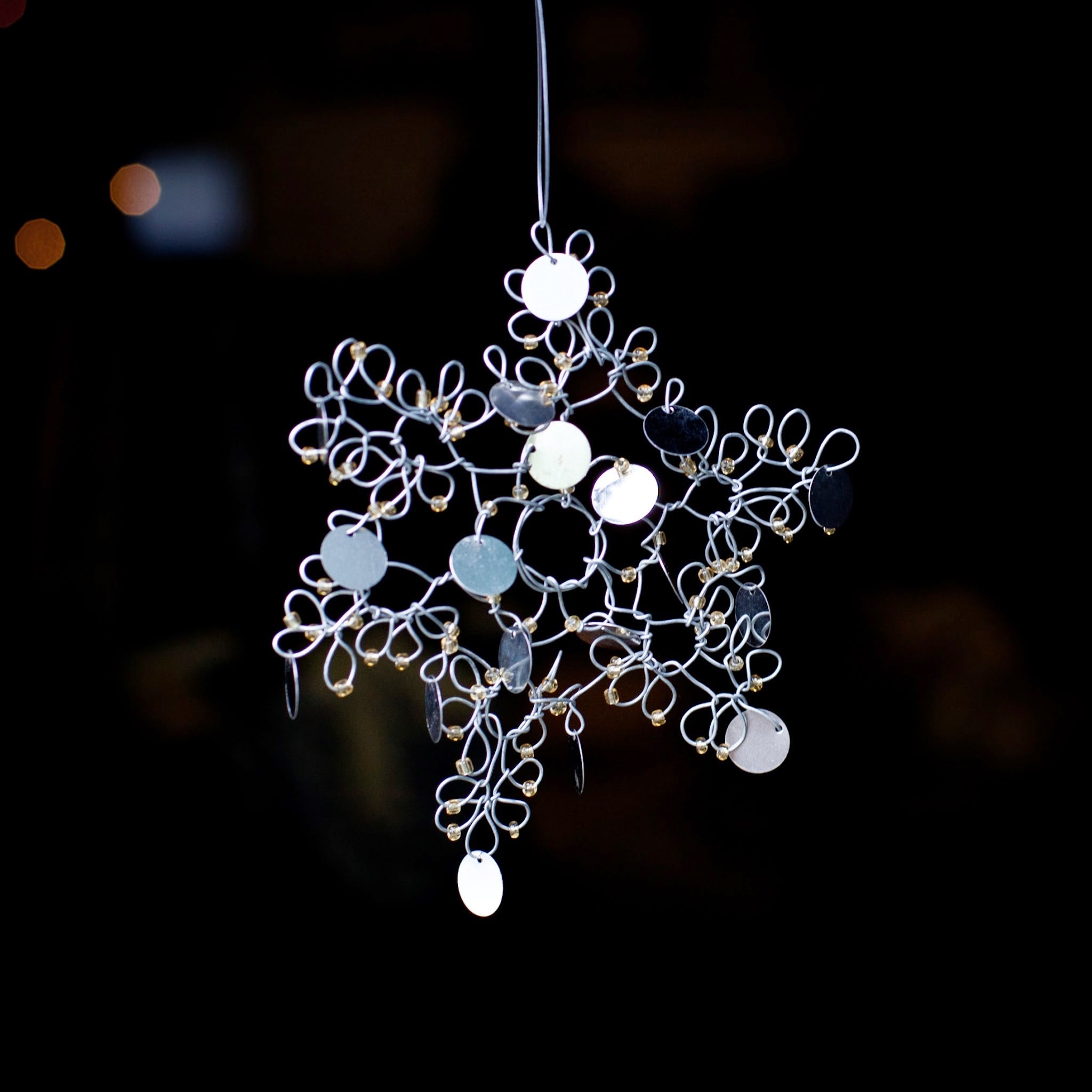 Snowflake Wire Ornament - Kenyan materials and design for a fair trade social enterprise