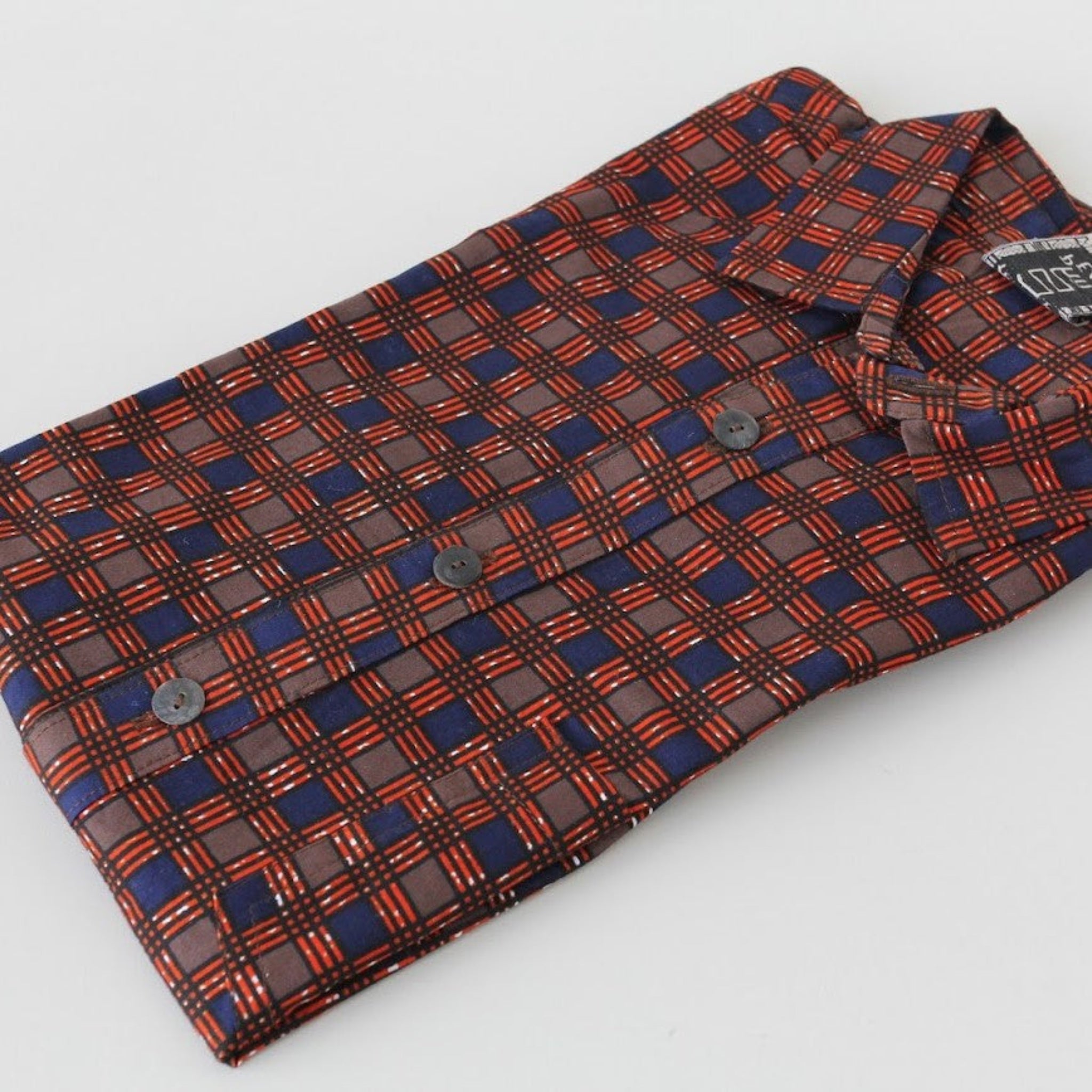 Men's kitenge shirt handmade by the women of Amani ya Juu in Kenya for a fair trade social enterprise