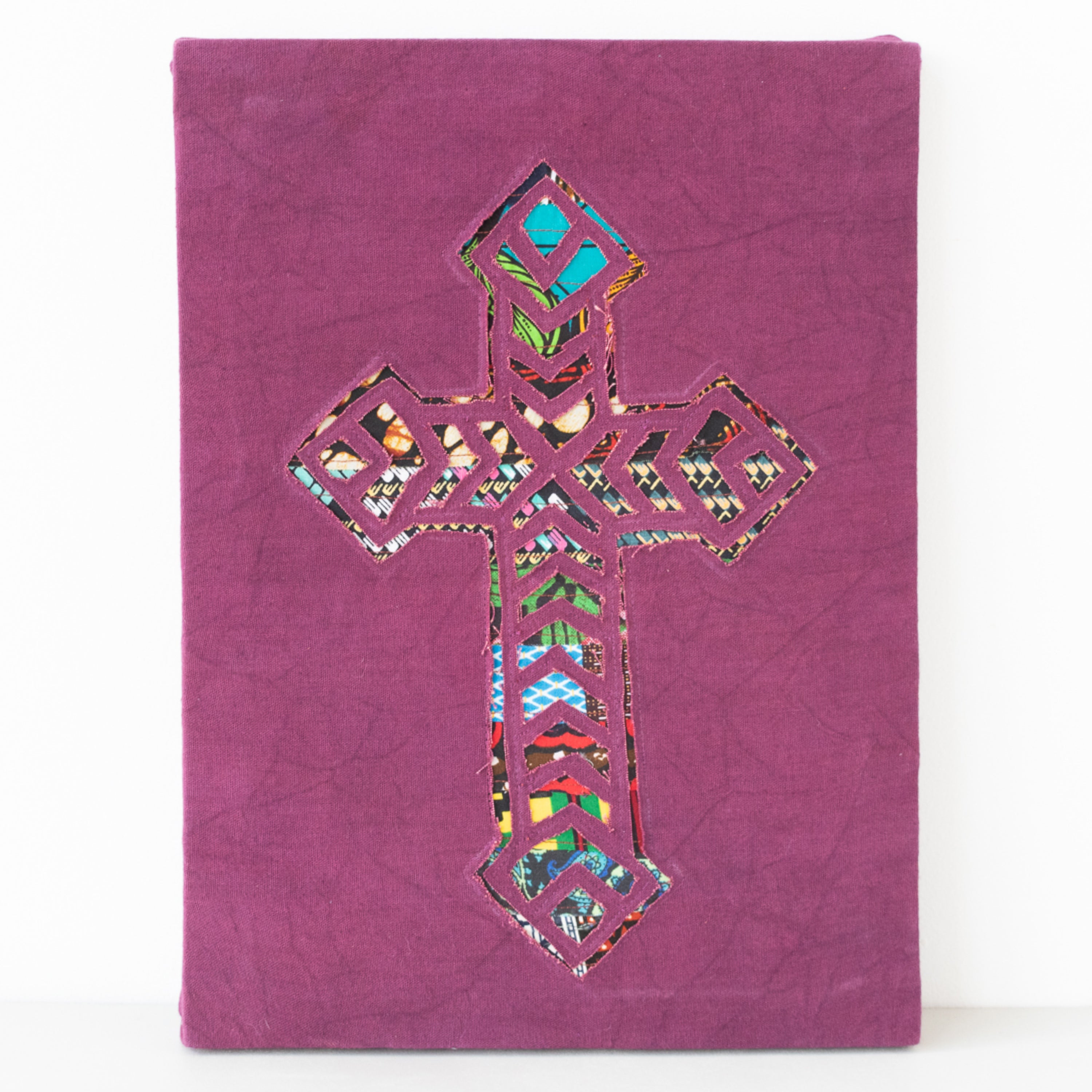 Cross wall hanging hand made from African fabrics, from Amani ya Juu in Kenya, a fair trade socio-economic sewing program
