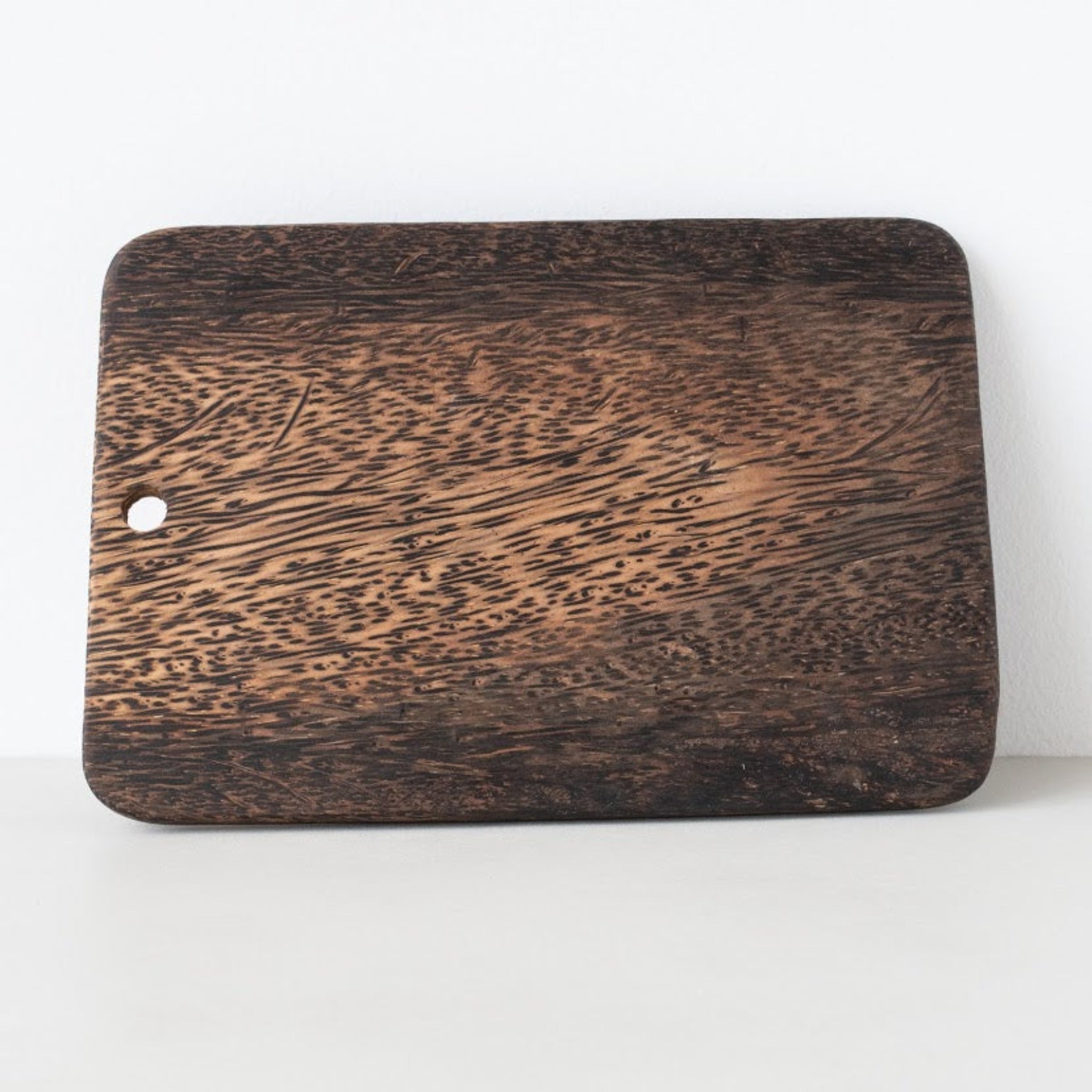 Palm Wood Cutting Board on a white background.