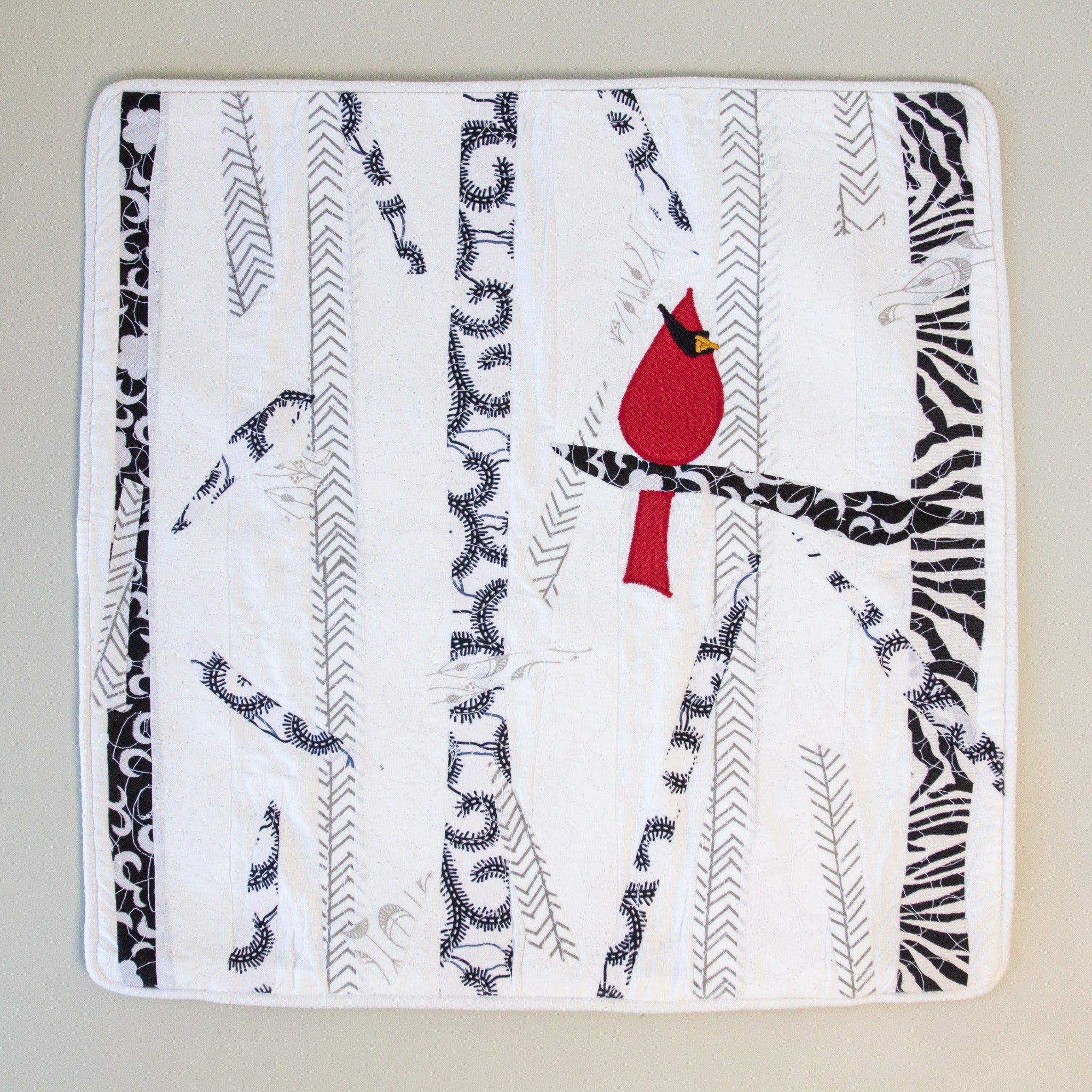 Snow Cardinal Pillow Case - handmade by the women of Amani using Kenyan materials for a Fair Trade social enterprise