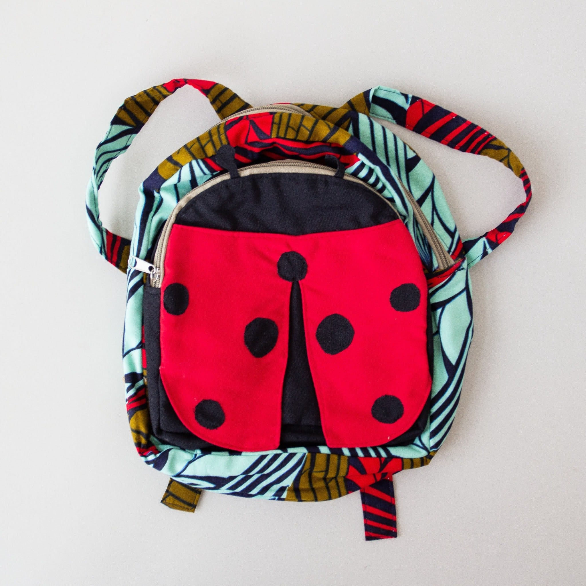 Ladybug Backpack - handmade by the women of Amani using Kenyan materials for a Fair Trade boutique