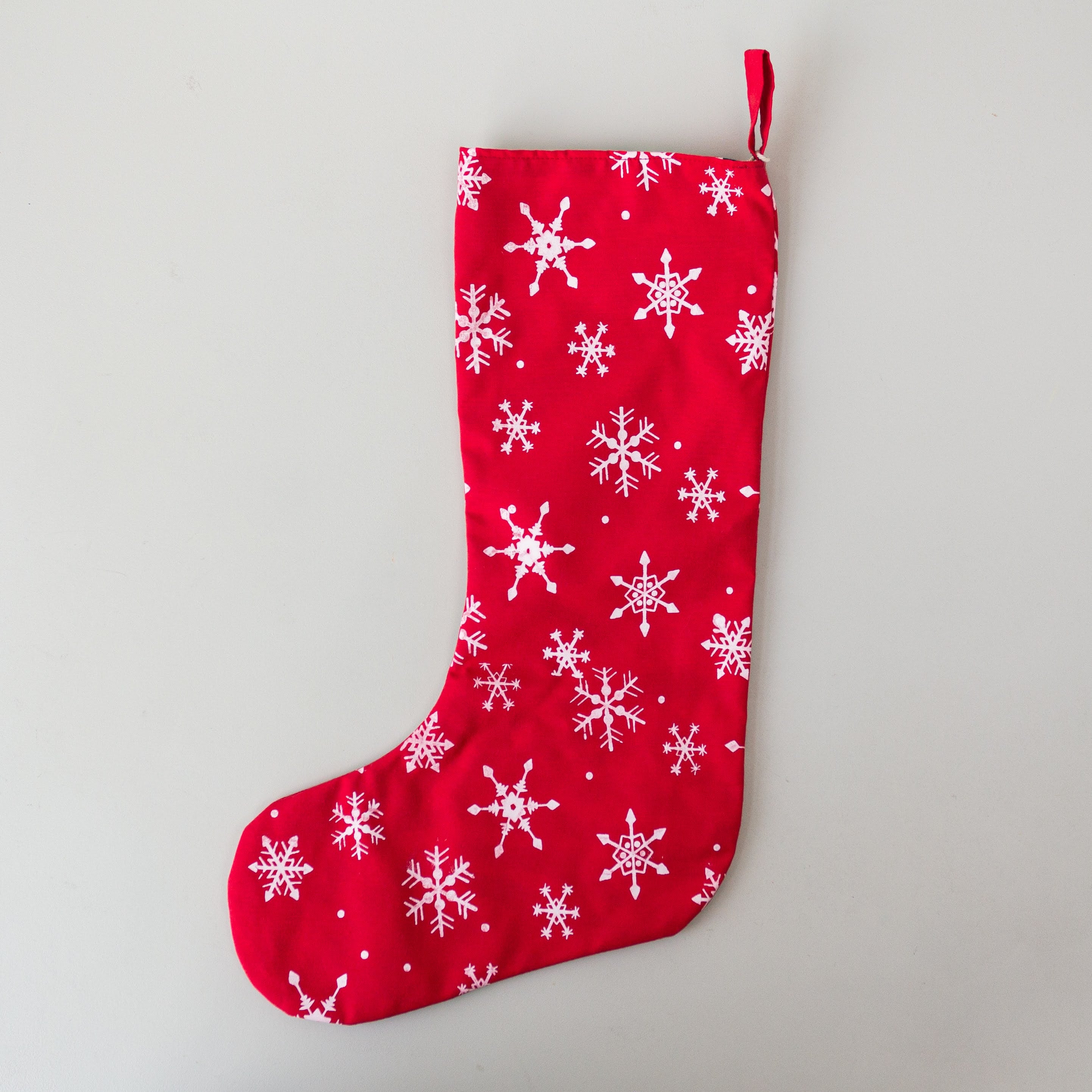 Snowflake Stocking - handmade using Kenyan materials by the women of Amani for a Fair Trade social enterprise