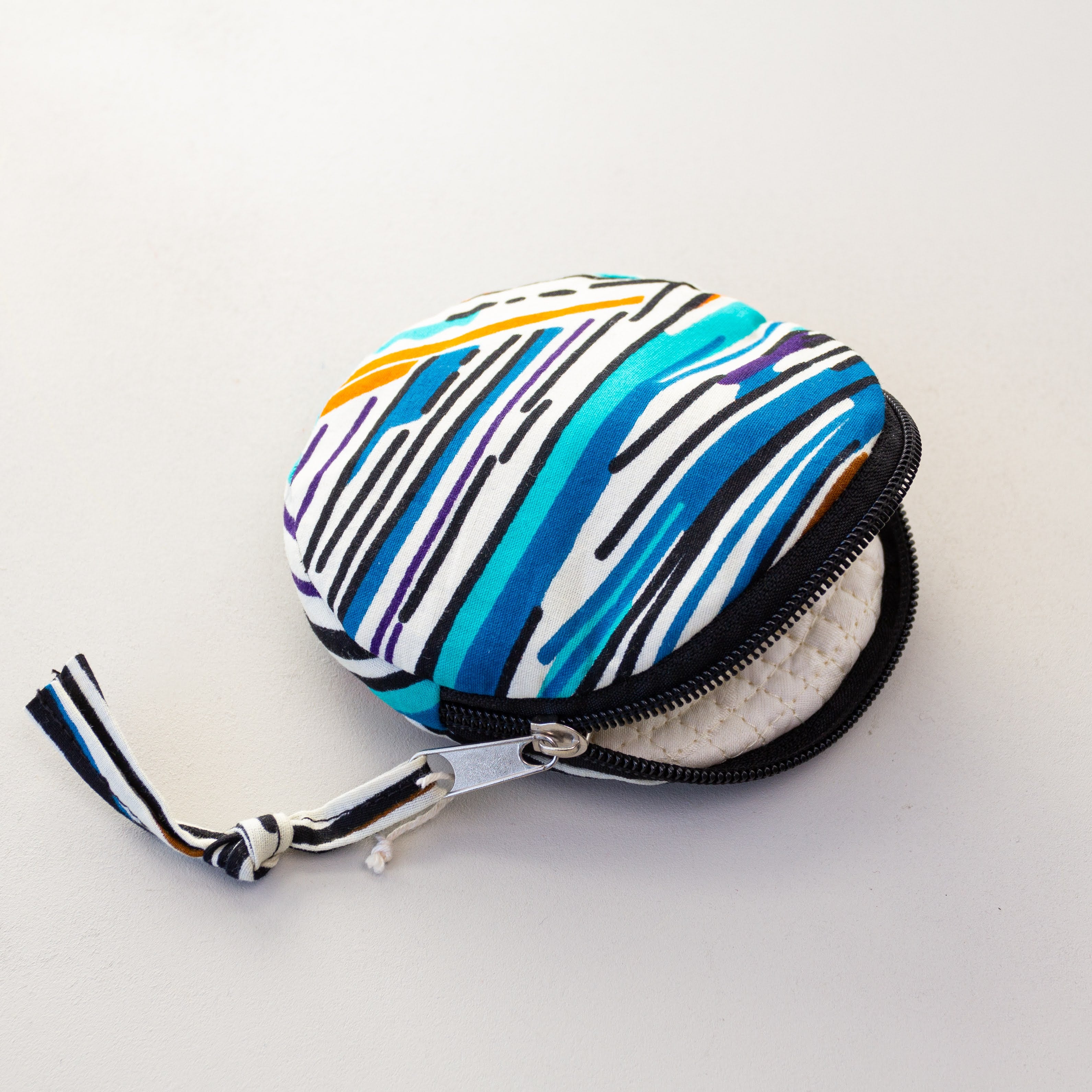 Round Pouch - handmade by the women of Uganda using local materials for a Fair Trade boutique