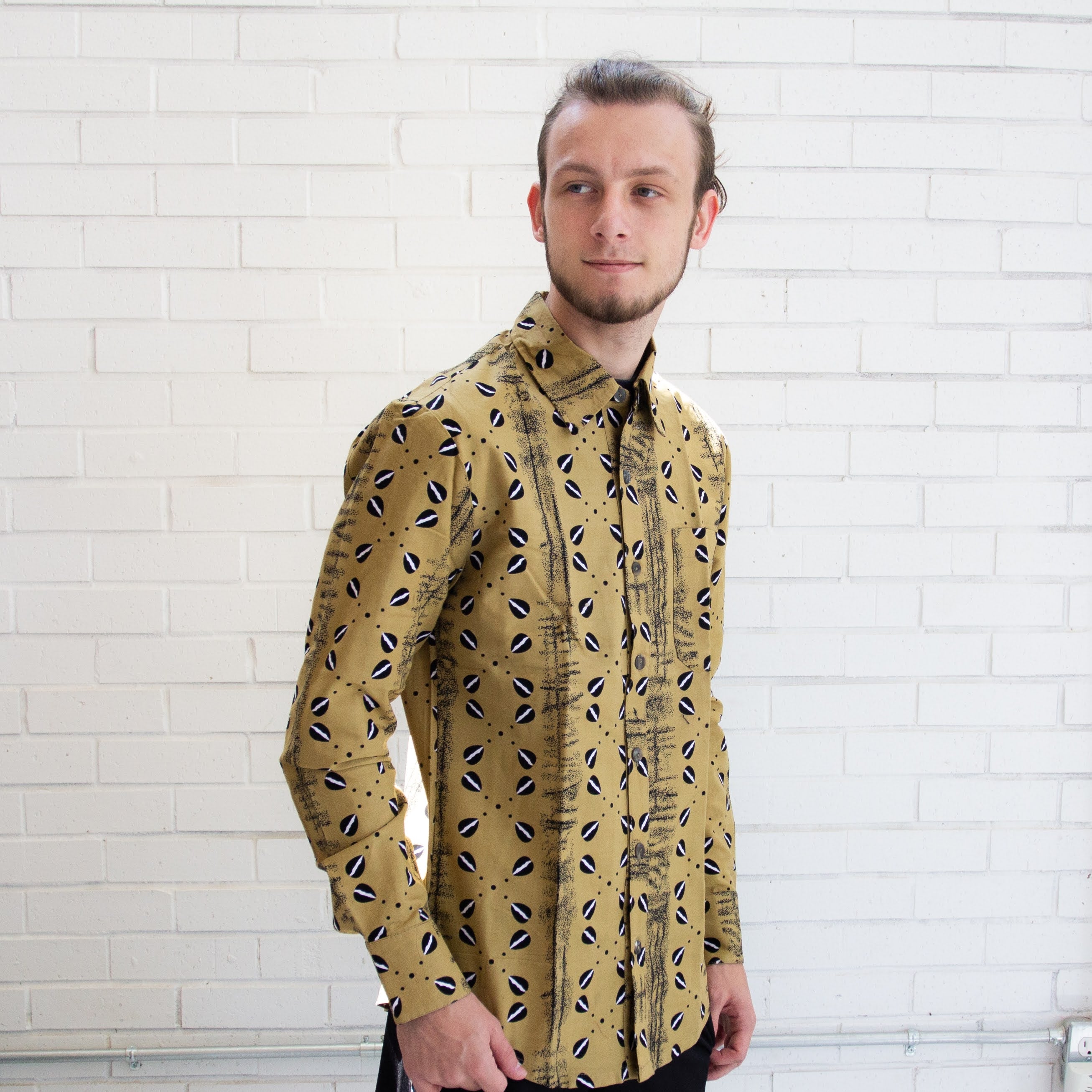 Men's kitenge shirt handmade by the women of Amani ya Juu in Kenya for a fair trade social enterprise