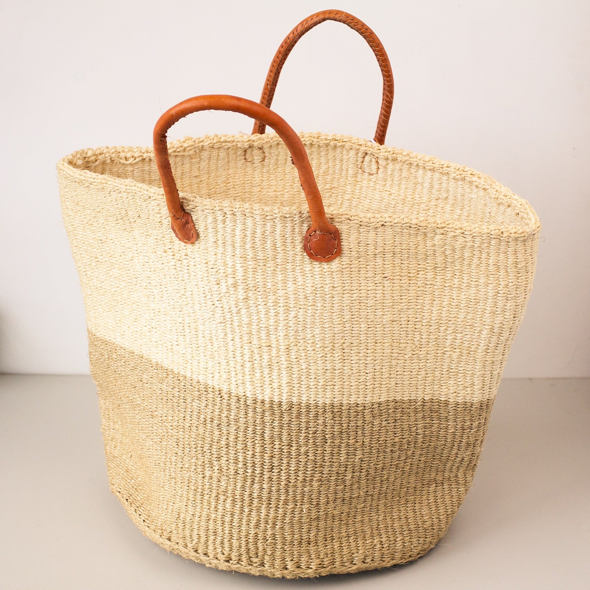 A Fair Trade handwoven sisal basket made by Kenyan artisans for a social enterprise