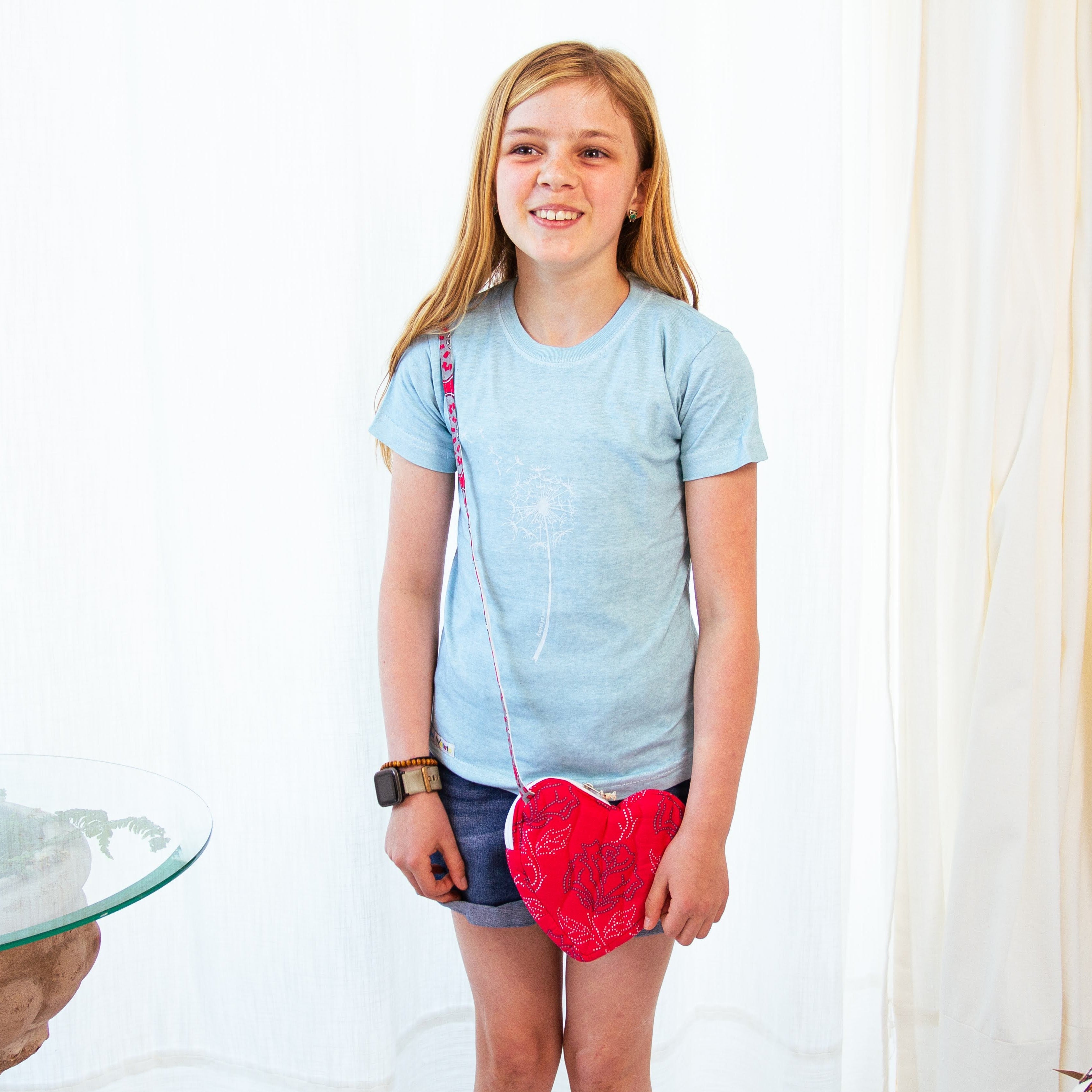 Loving Heart little girls purse handcrafted from kitenge fabric by African refugee women in Nairobi Kenya for a social enterprise