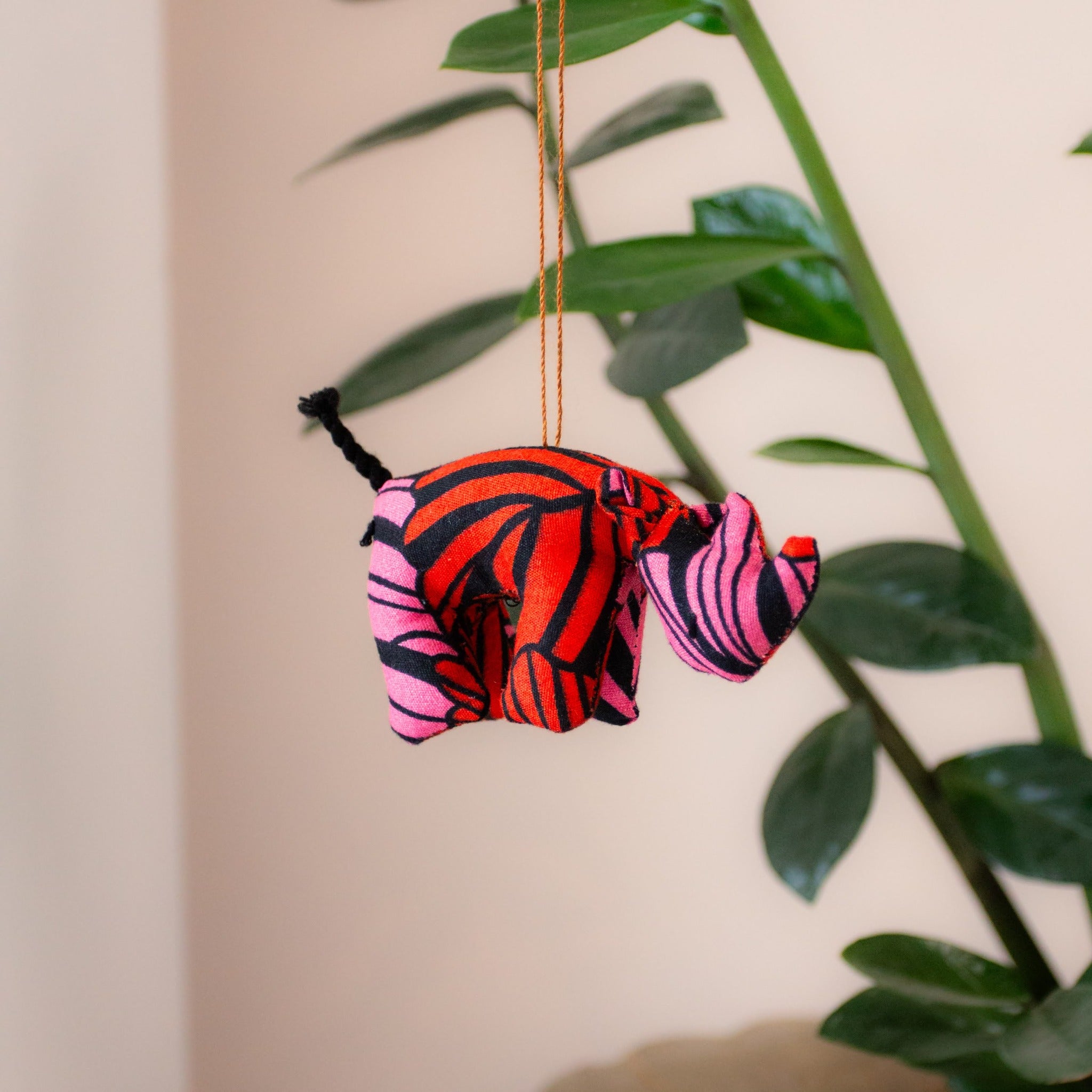 Plush Animal Ornaments - handmade in Uganda using African materials and design for a fair trade boutique