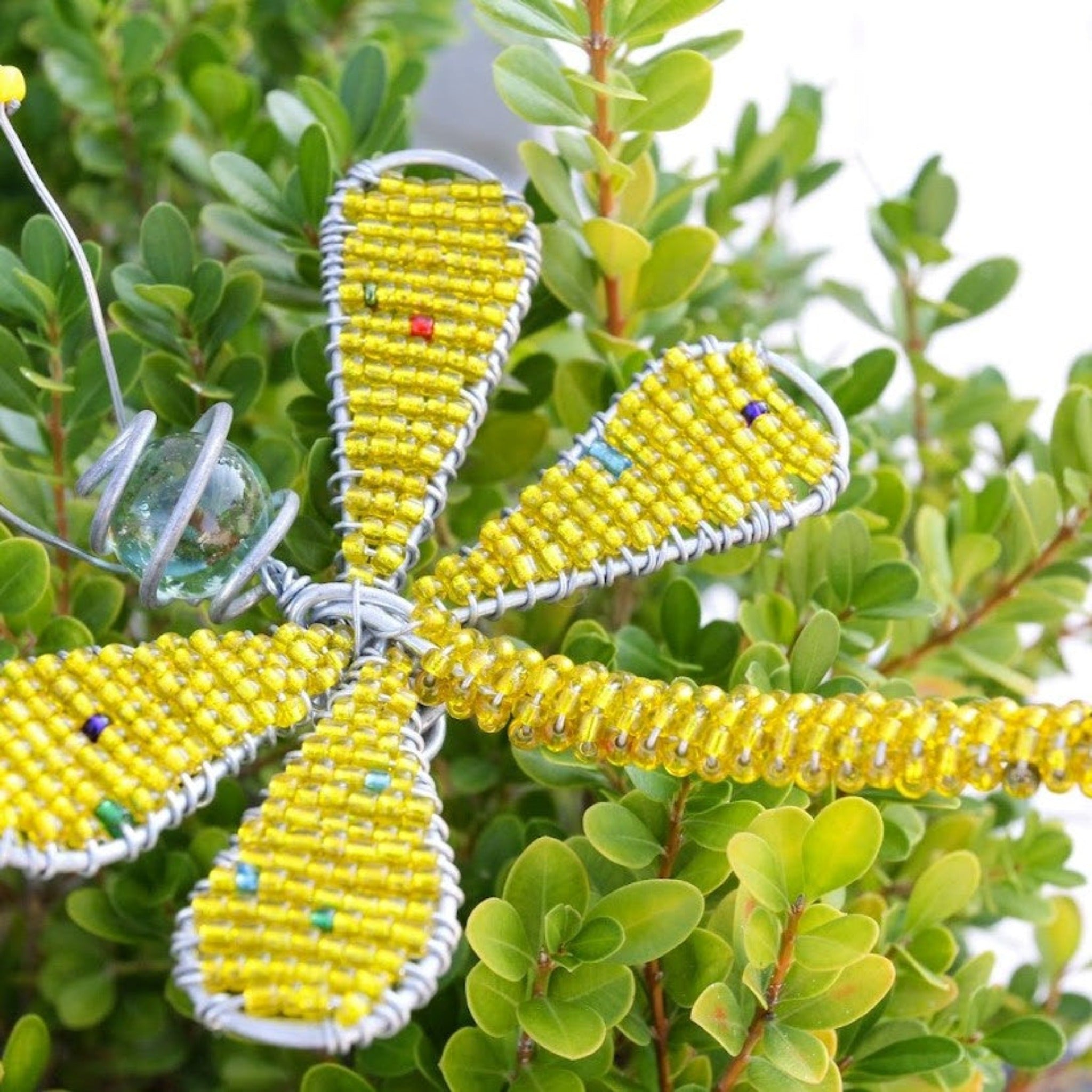 Beaded dragonfly hand crafted by Kenyan artisans for a fair trade social enterprise