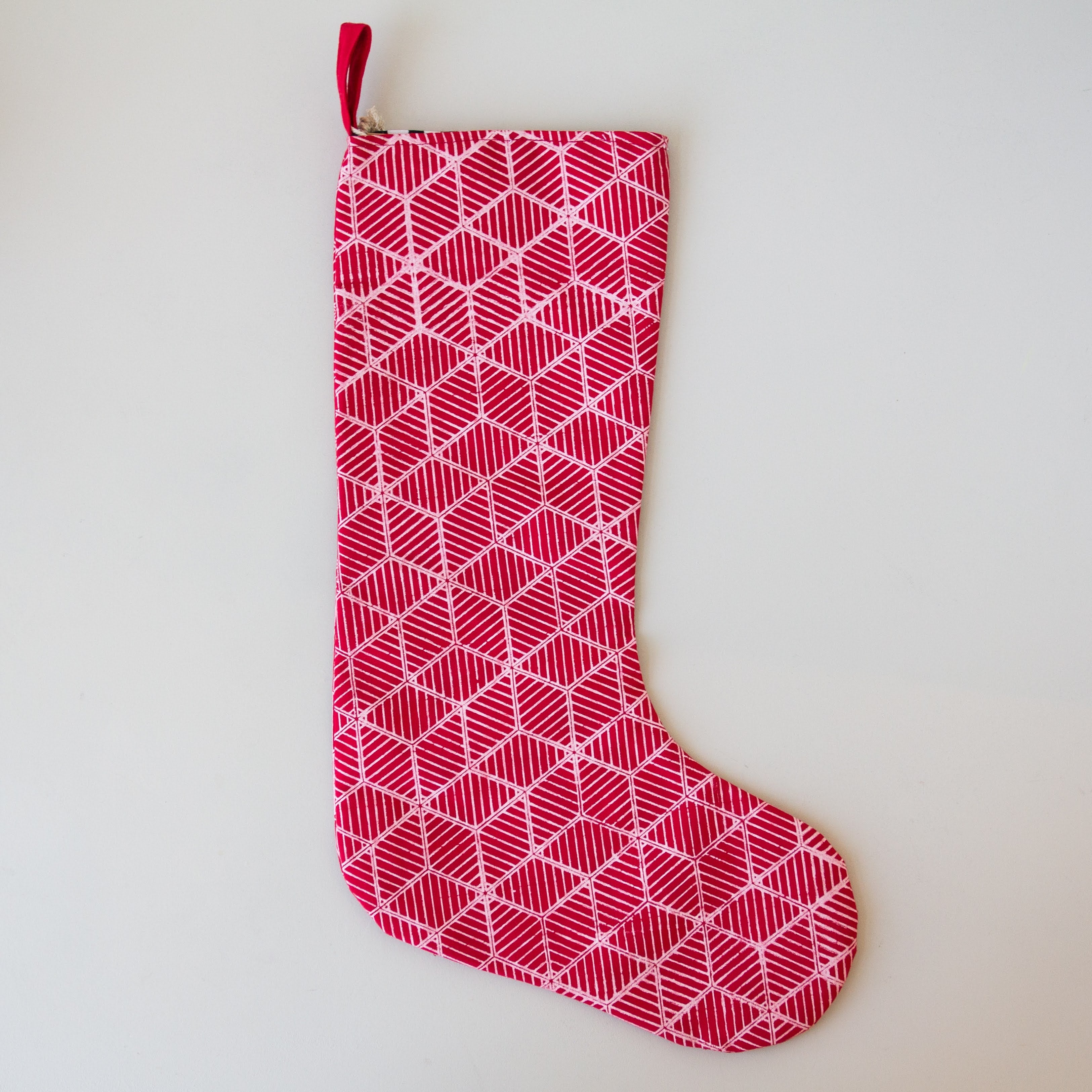 Maasai poinsettia Christmas stocking - handmade by the women of Amani ya Juu for a fair trade social enterprise