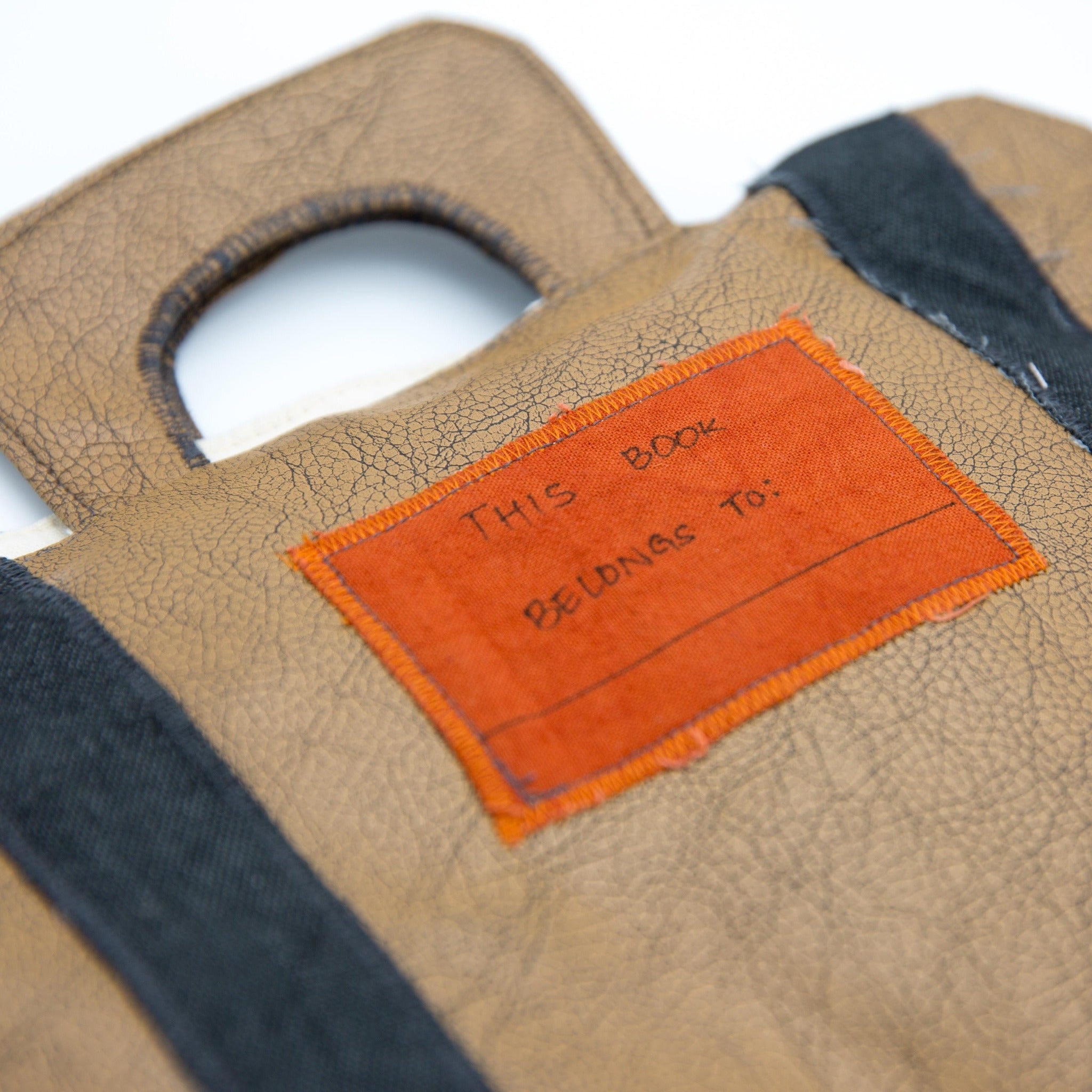 Busy Book - Kenyan materials and design for a fair trade boutique