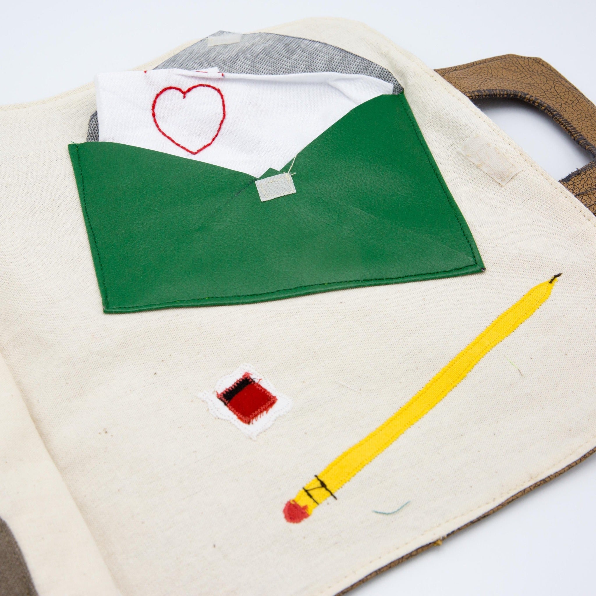 Busy Book - Kenyan materials and design for a fair trade boutique