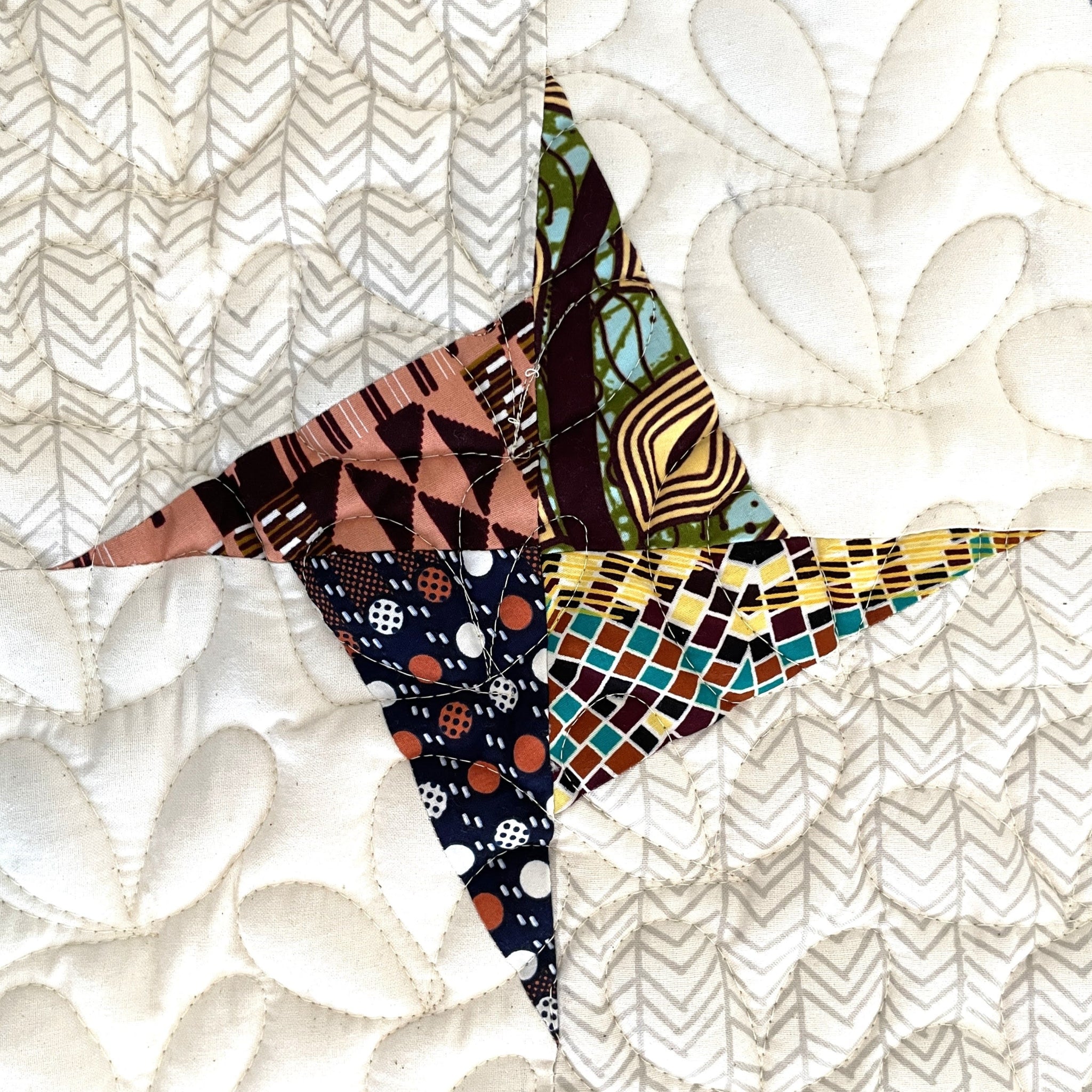 Detail of a pinwheel quilt.