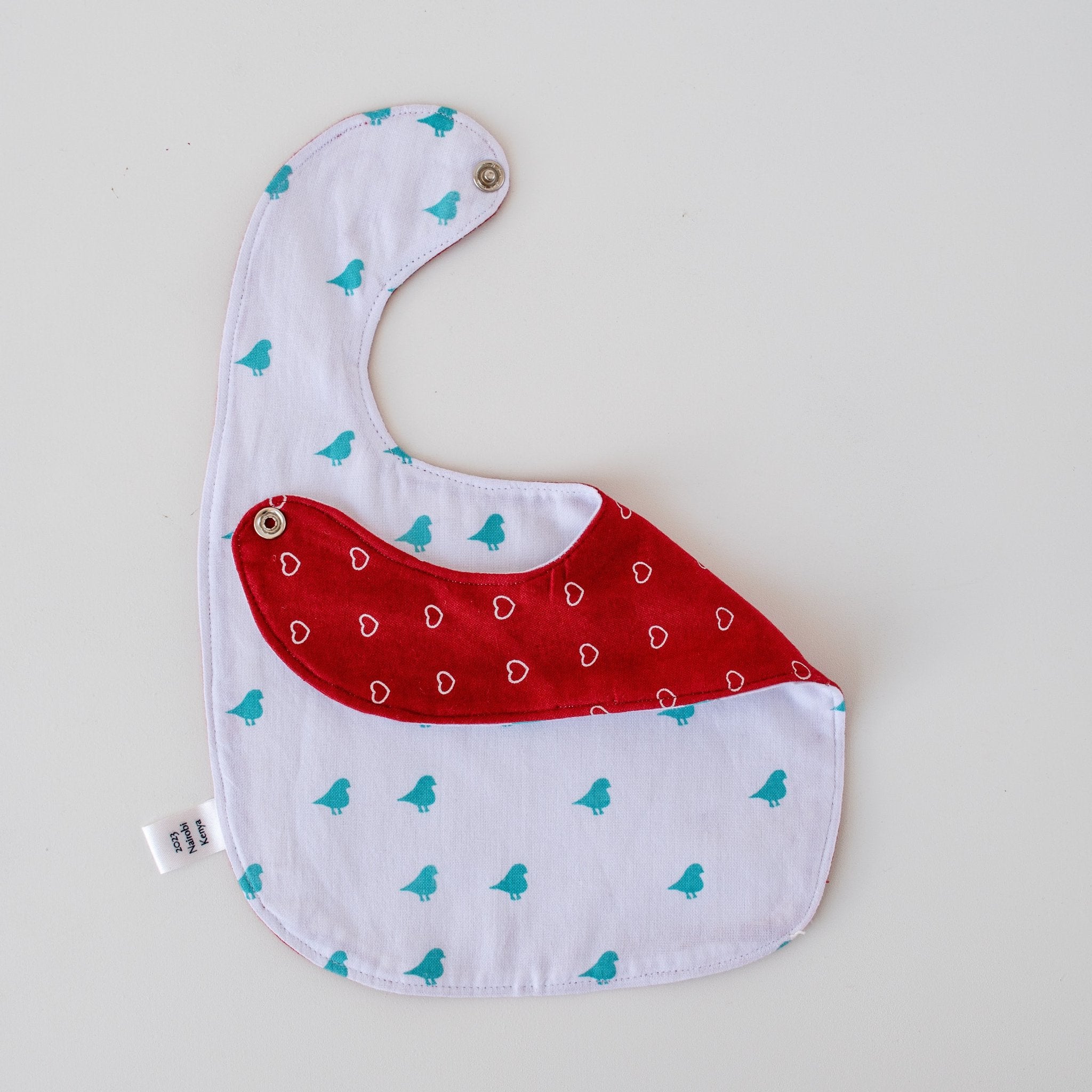 Watoto Baby Bib - Kenyan materials and design for a fair trade boutique