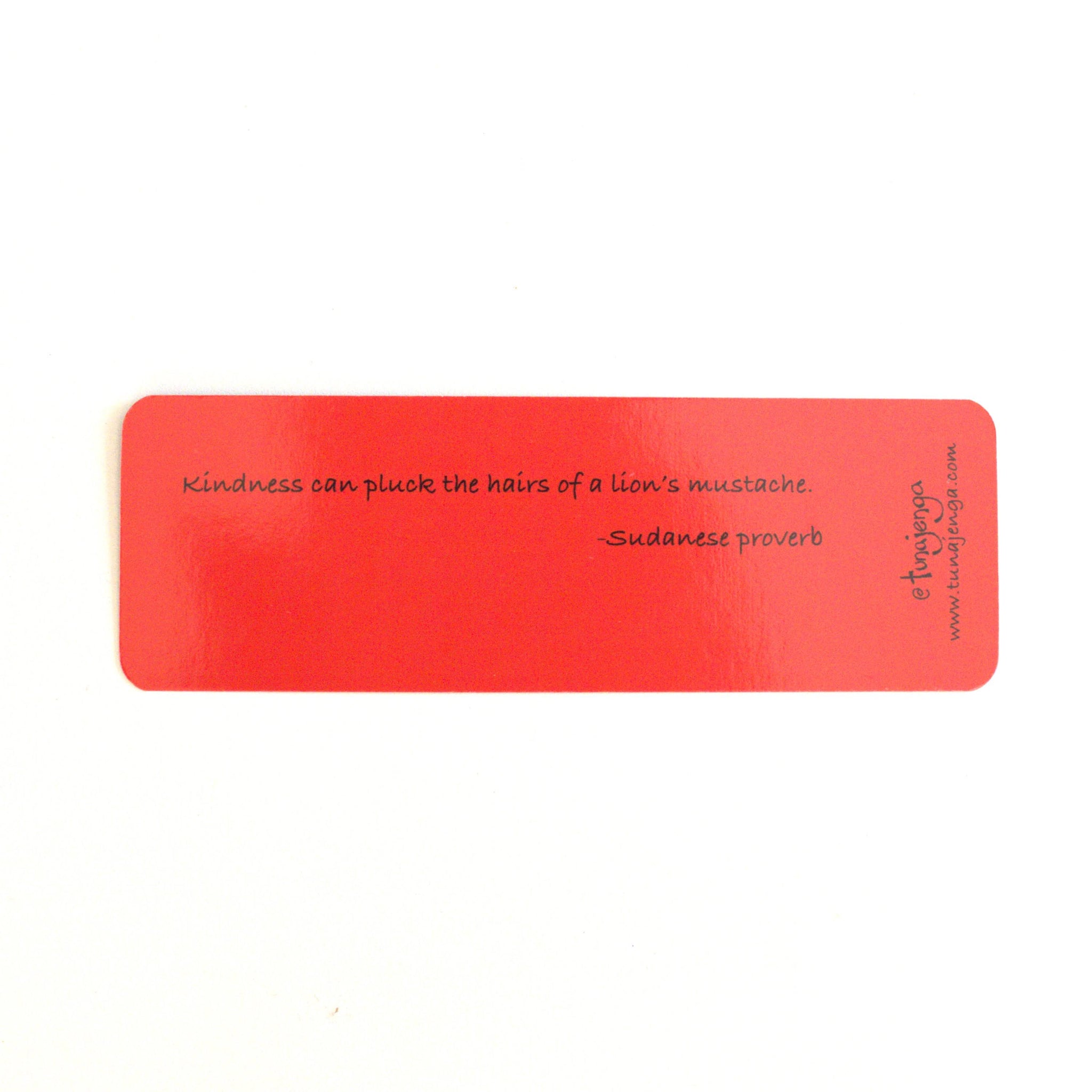 Red bookmark with a Sudanese proverb on a white background