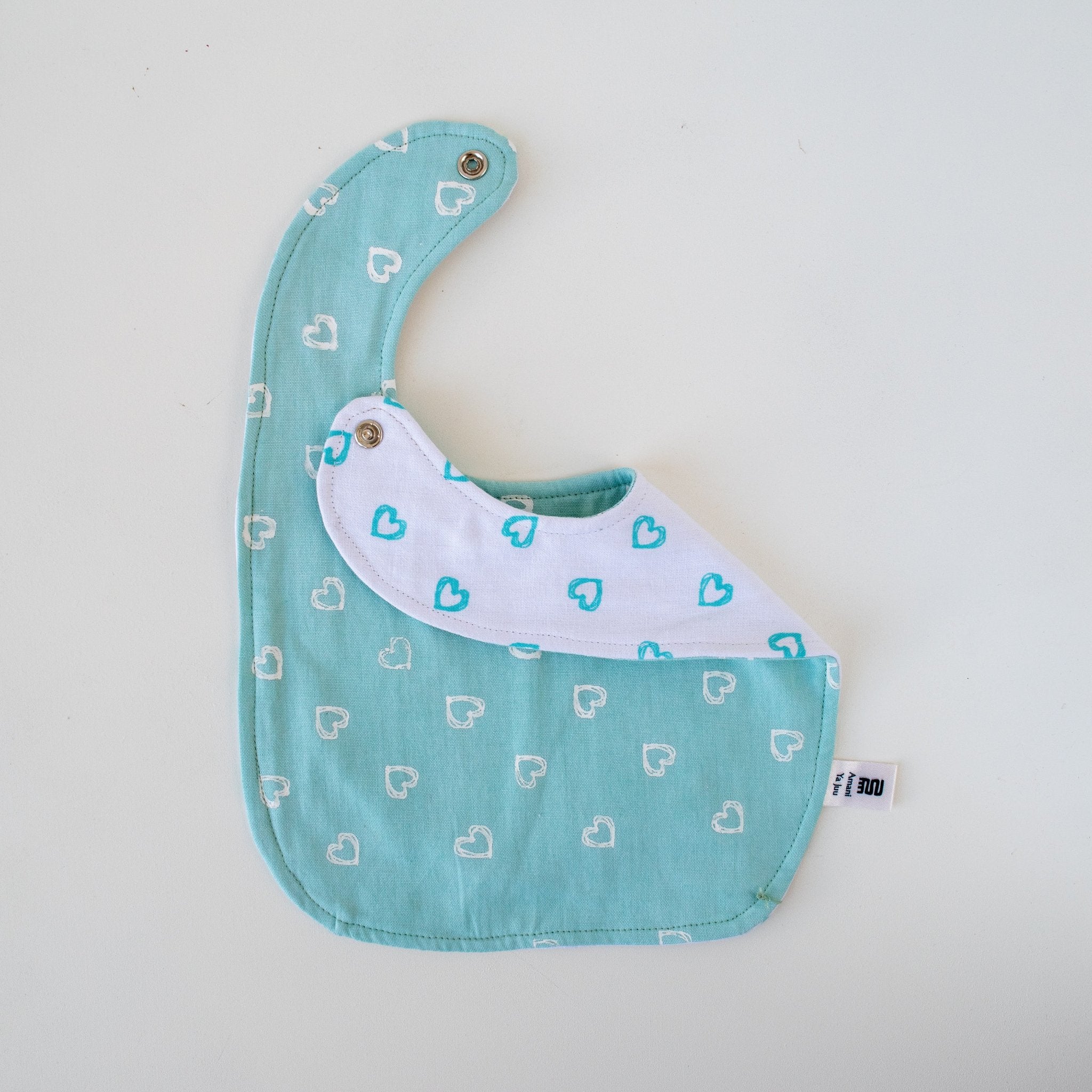 Watoto Baby Bib - Kenyan materials and design for a fair trade boutique